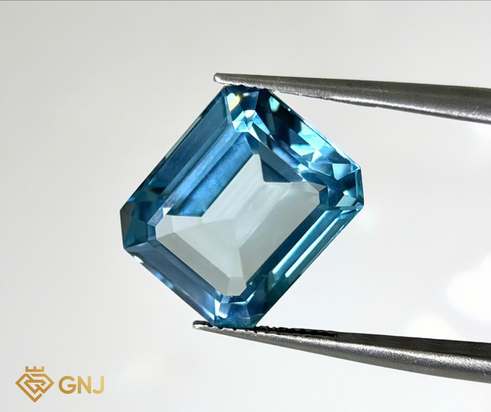 Đá Topaz Xanh Tự Nhiên 11.8ct — mặt trước, đá quý tự nhiên có kiểm định GNJ