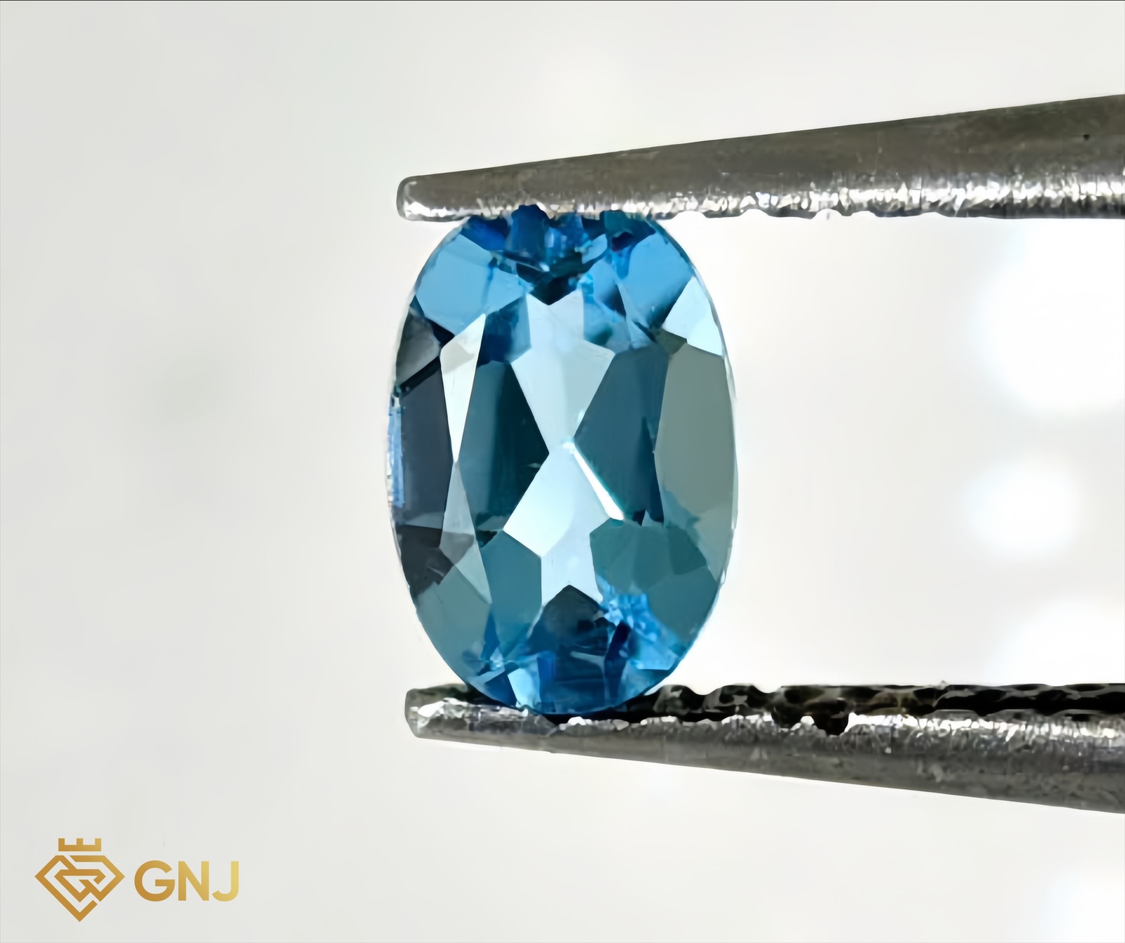 Đá Topaz Xanh Tự Nhiên Xanh Dương 0.8ct — mặt trước, đá quý tự nhiên có kiểm định GNJ