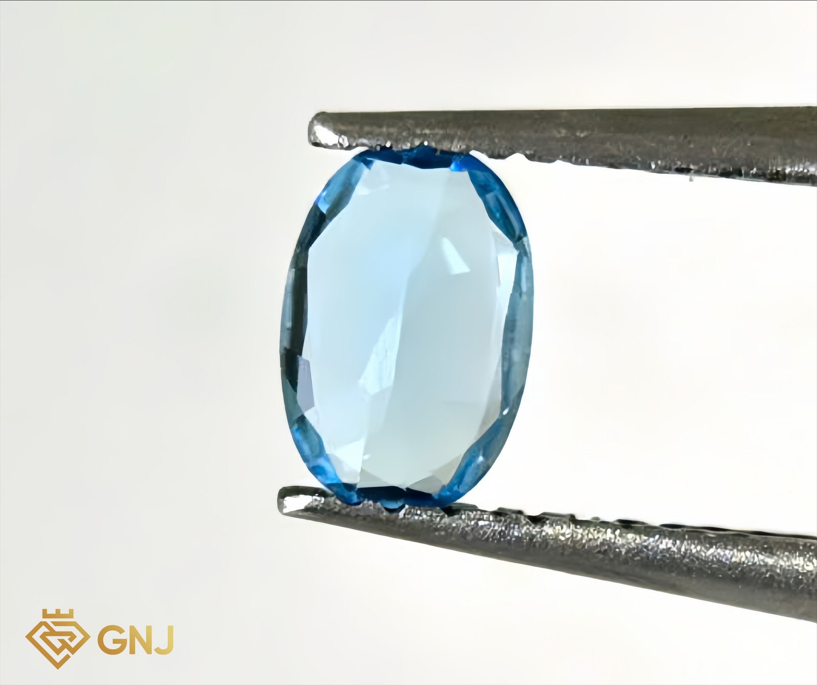 Đá Topaz Xanh Tự Nhiên Xanh Dương 0.8ct — mặt bên