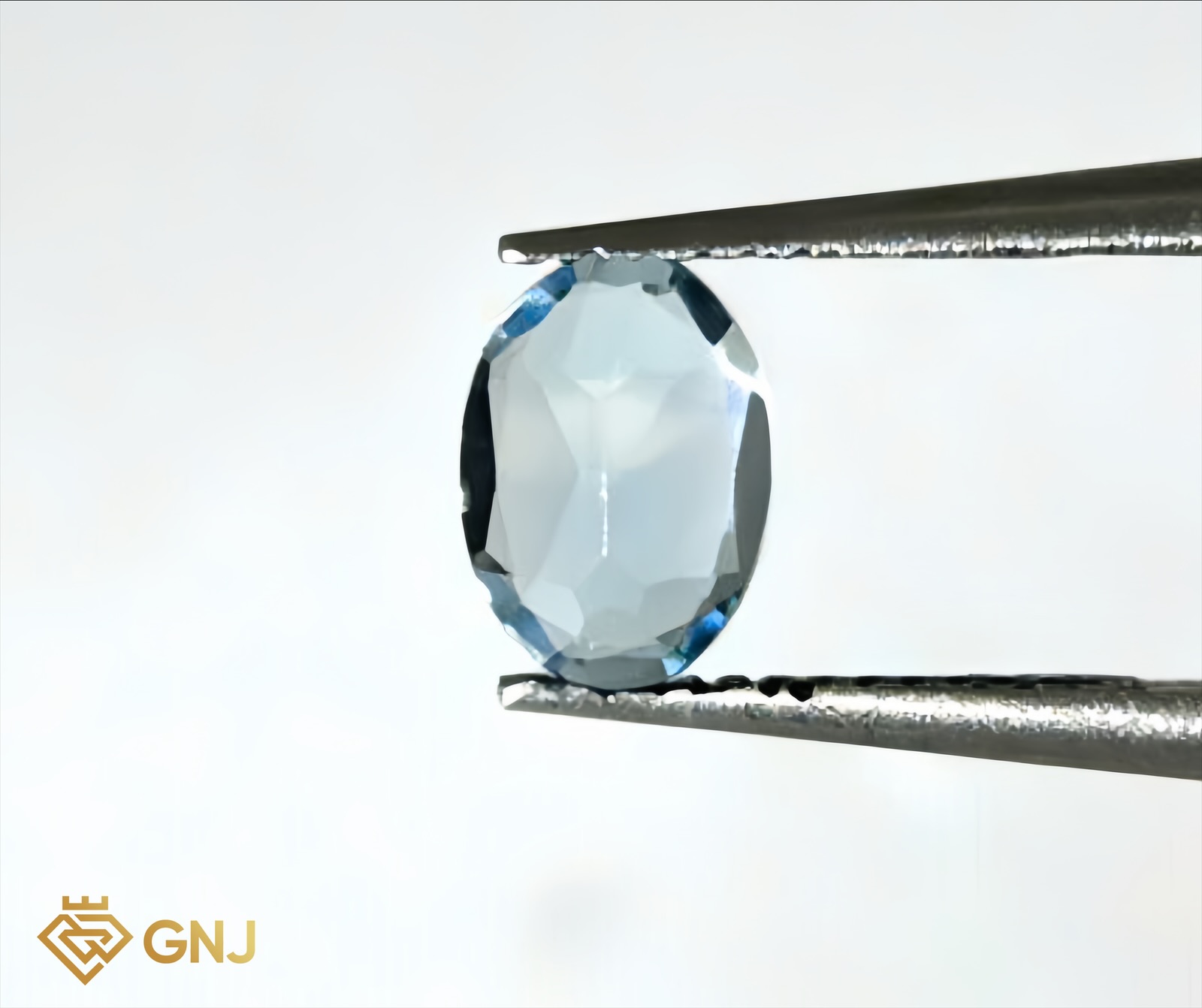 Đá Topaz Xanh Tự Nhiên 0.55ct — mặt bên