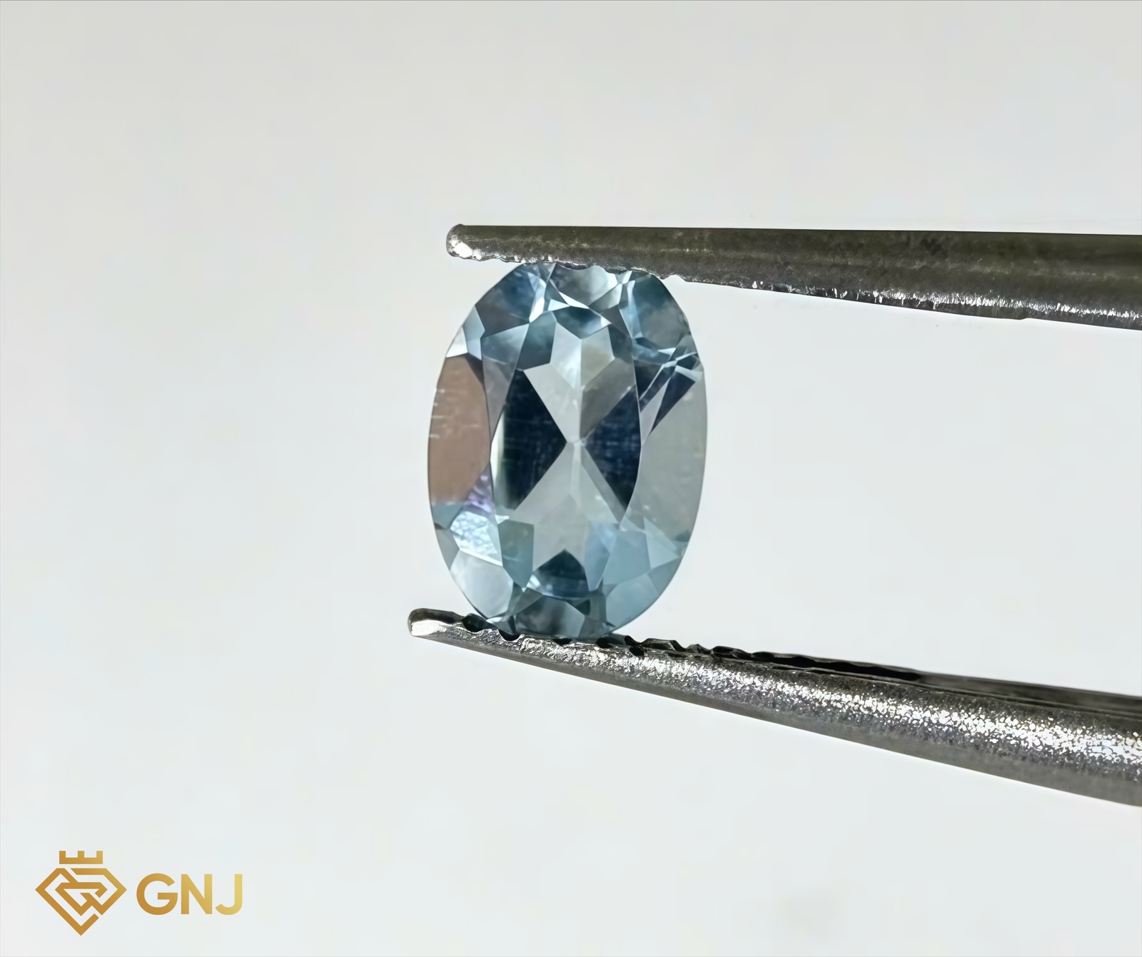 Đá Topaz Xanh Tự Nhiên 0.95ct — 7.1x5.0mm — mặt trước, đá quý tự nhiên có kiểm định GNJ