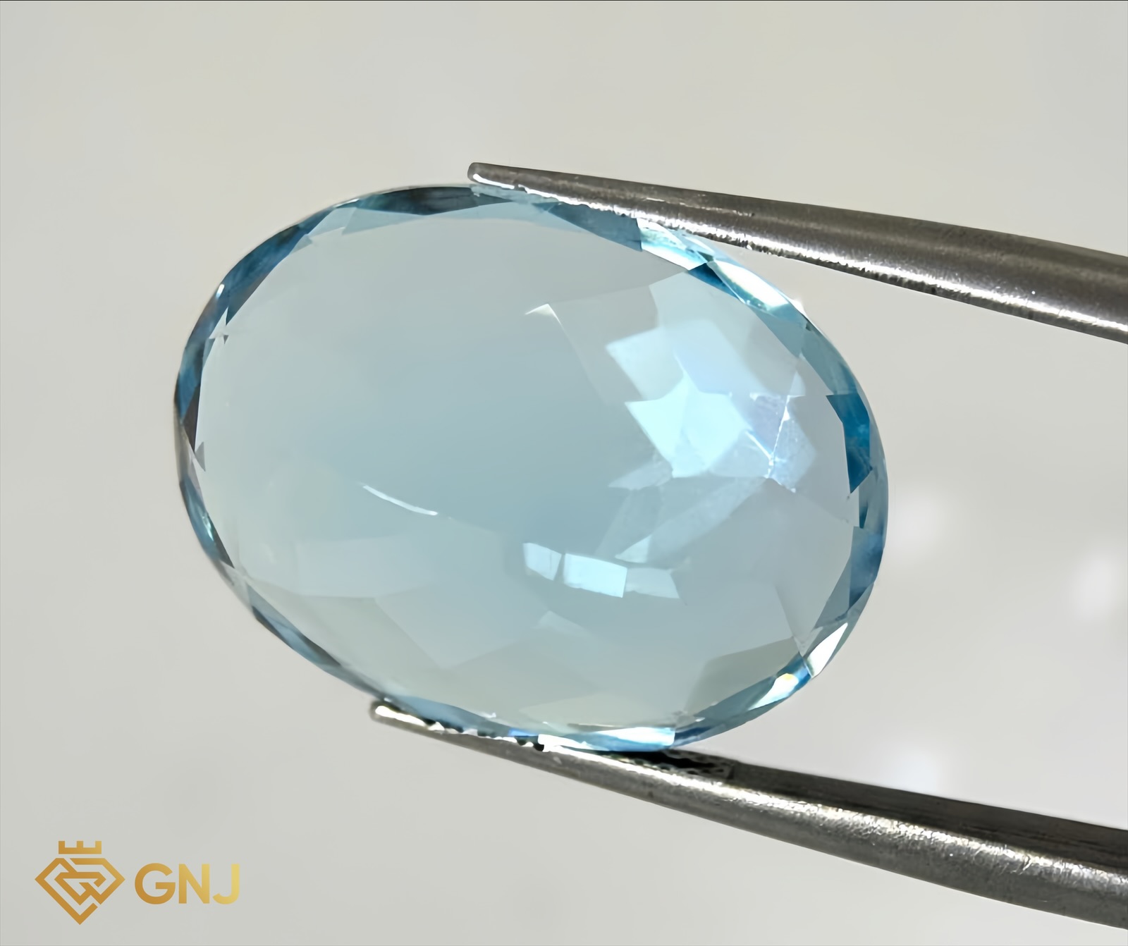 Đá Topaz Xanh Tự Nhiên 23.05ct — mặt bên