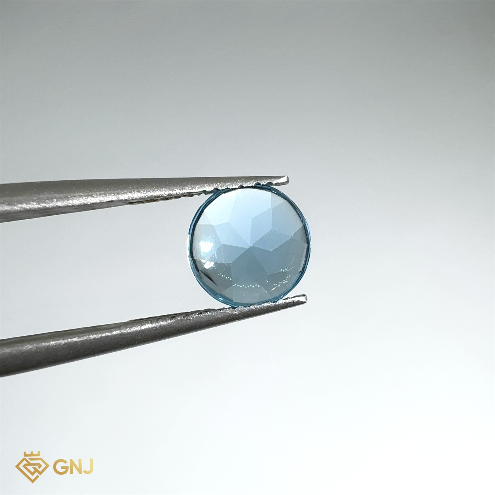 Đá Topaz Xanh Tự Nhiên Xanh Dương 1.2ct — mặt bên