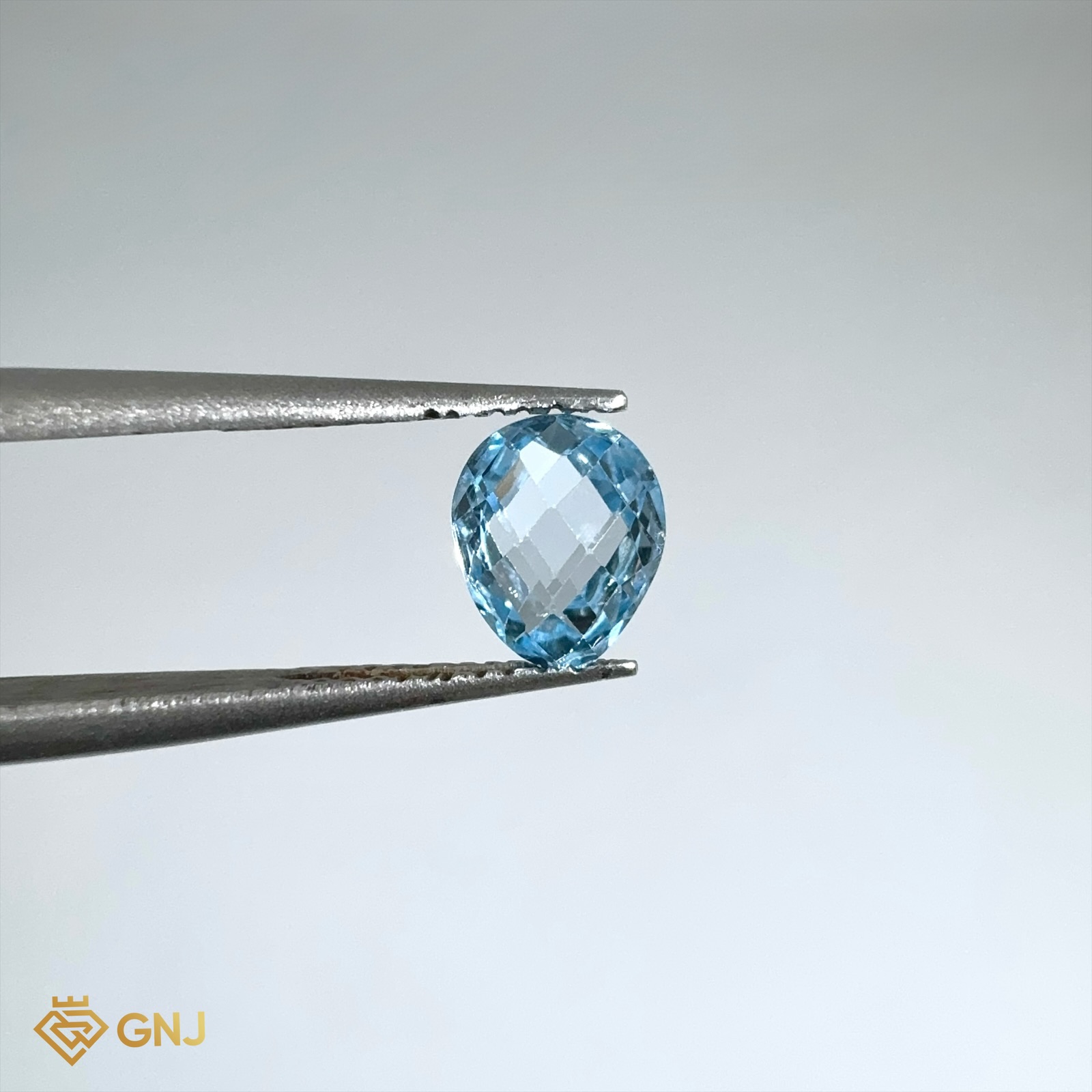 Đá Topaz Xanh Tự Nhiên Xanh Dương 1.2ct — mặt trước, đá quý tự nhiên có kiểm định GNJ