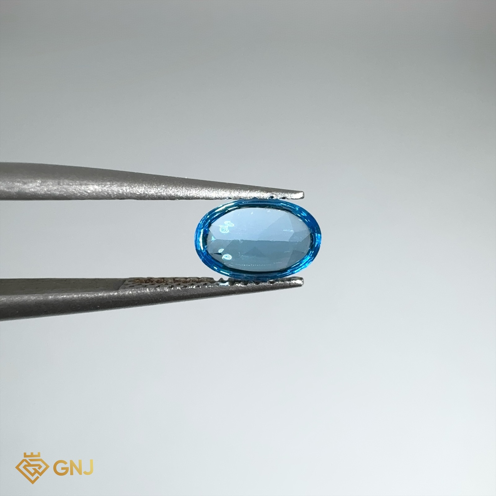 Đá Topaz Xanh Tự Nhiên Xanh Dương 1.05ct — mặt bên