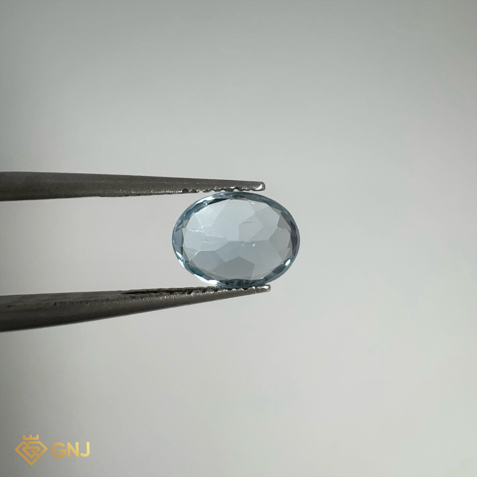 Đá Topaz Xanh Tự Nhiên 1.6ct — mặt bên