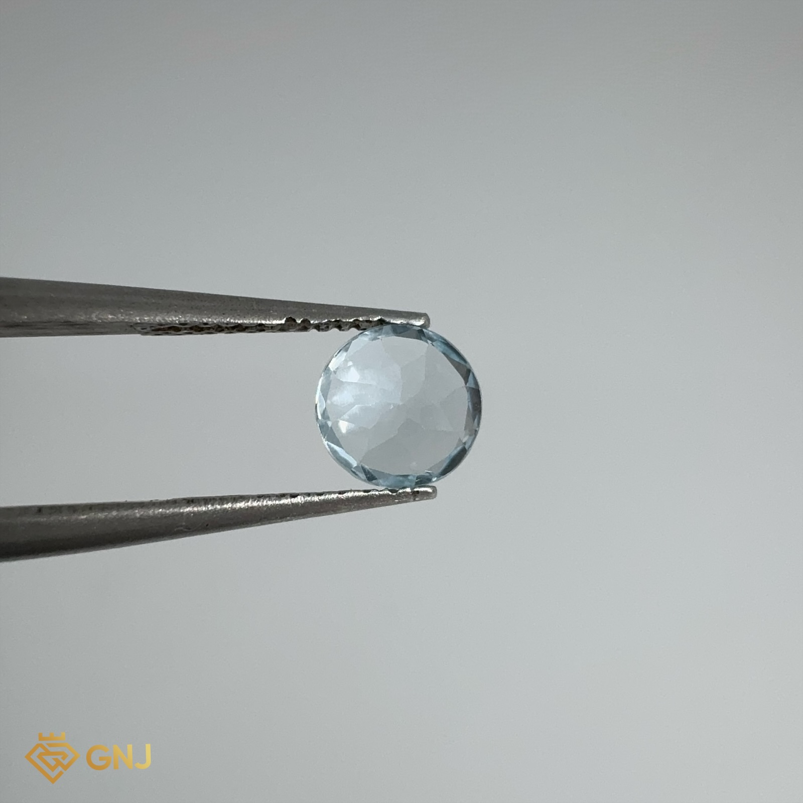 Đá Topaz Xanh Tự Nhiên 0.95ct — 5.8x5.8mm — mặt bên