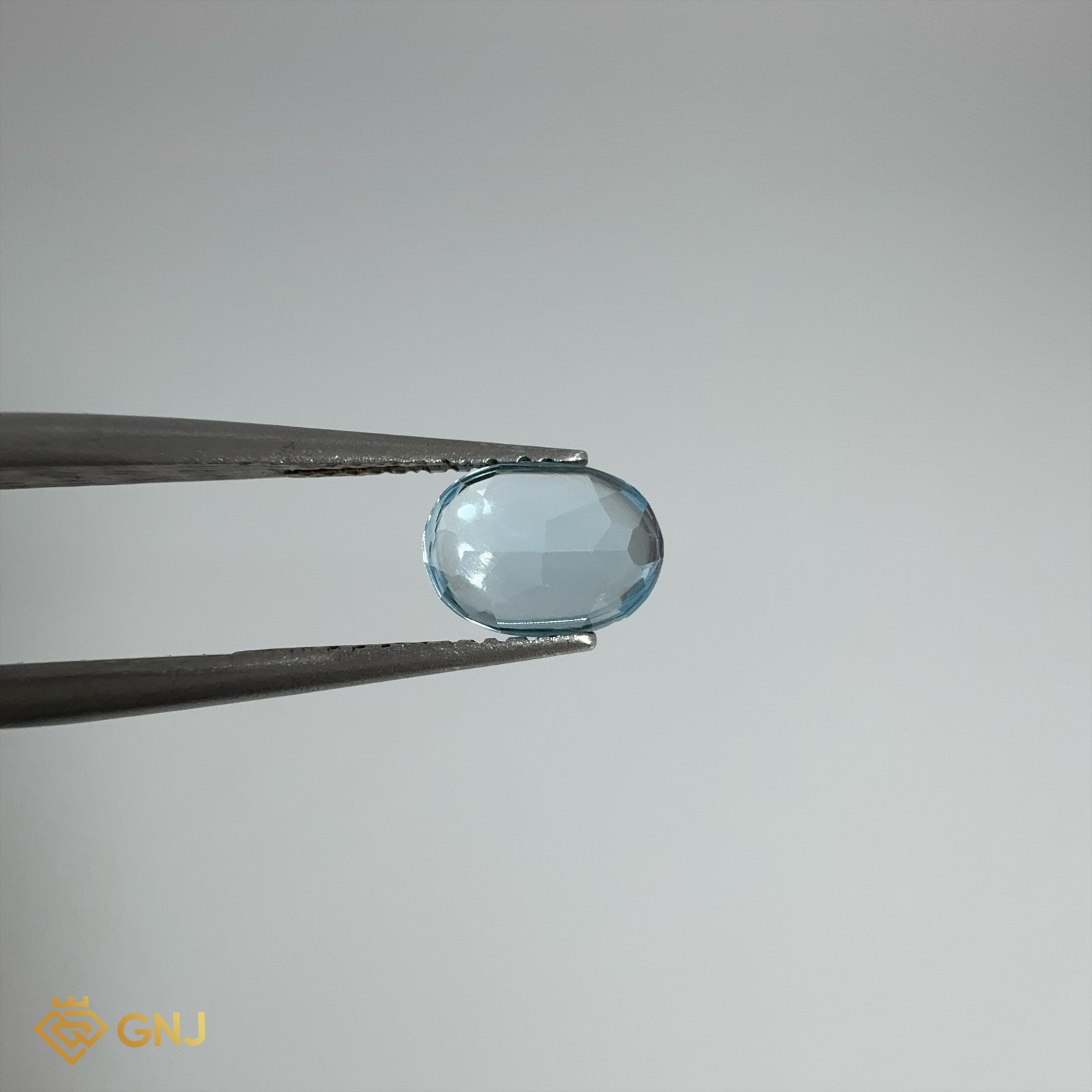 Đá Topaz Xanh Tự Nhiên 1.1ct — 7.0x5.1mm — mặt bên