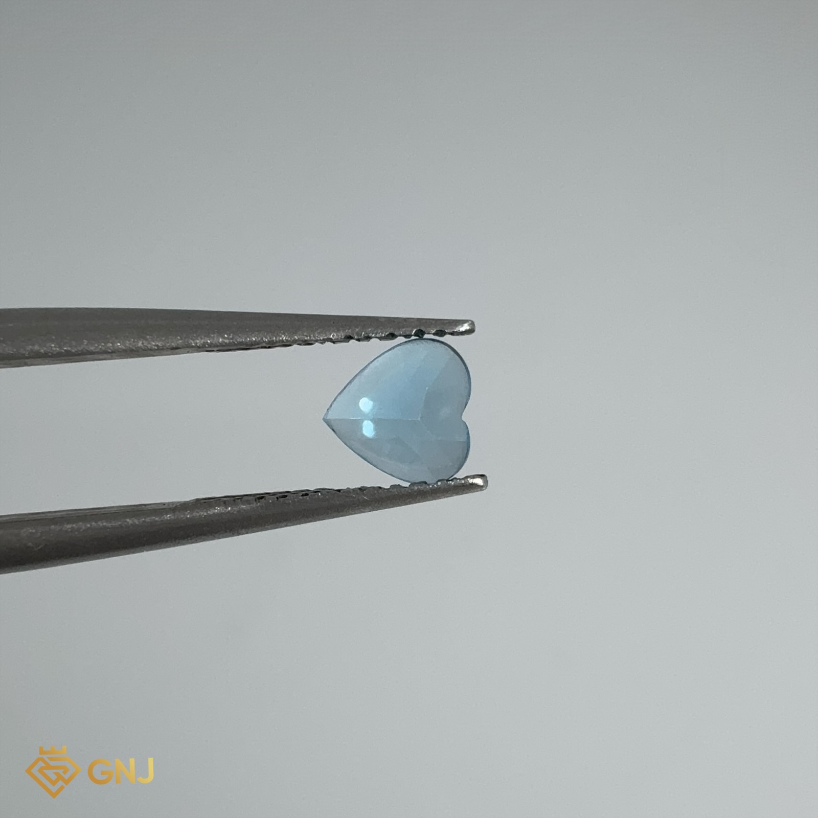 Đá Topaz Xanh Tự Nhiên 0.6ct — 5.0x4.8mm — mặt bên
