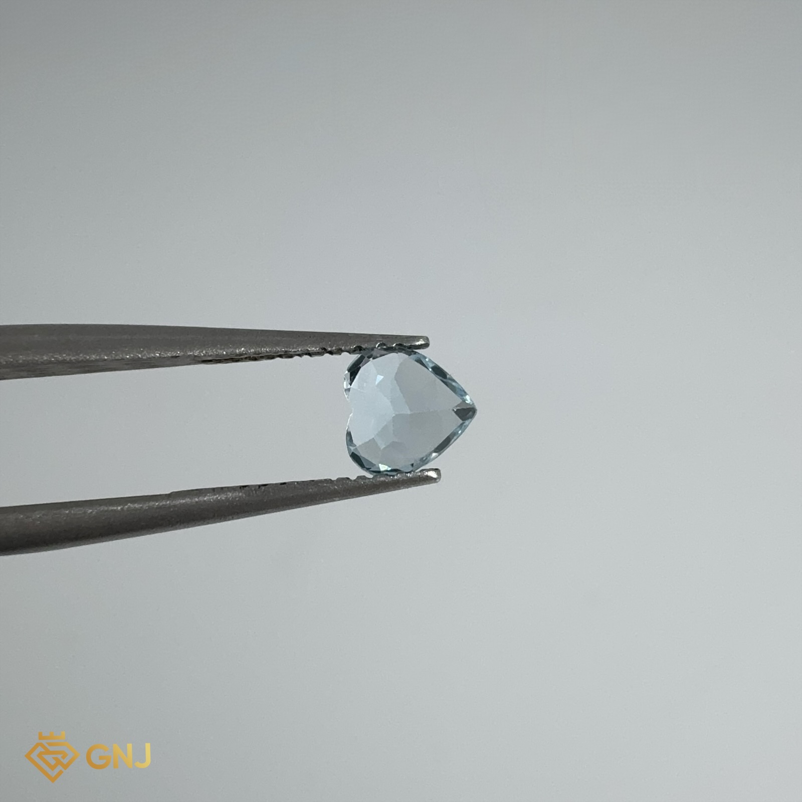 Đá Topaz Xanh Tự Nhiên 0.75ct — 5.1x5.2mm — mặt bên