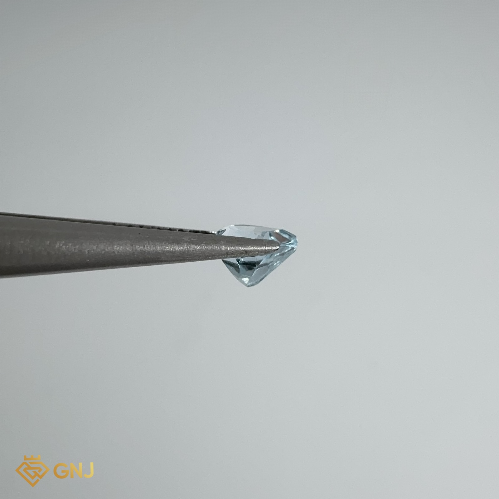 Đá Topaz Xanh Tự Nhiên 0.75ct — 5.1x5.2mm — chi tiết đá