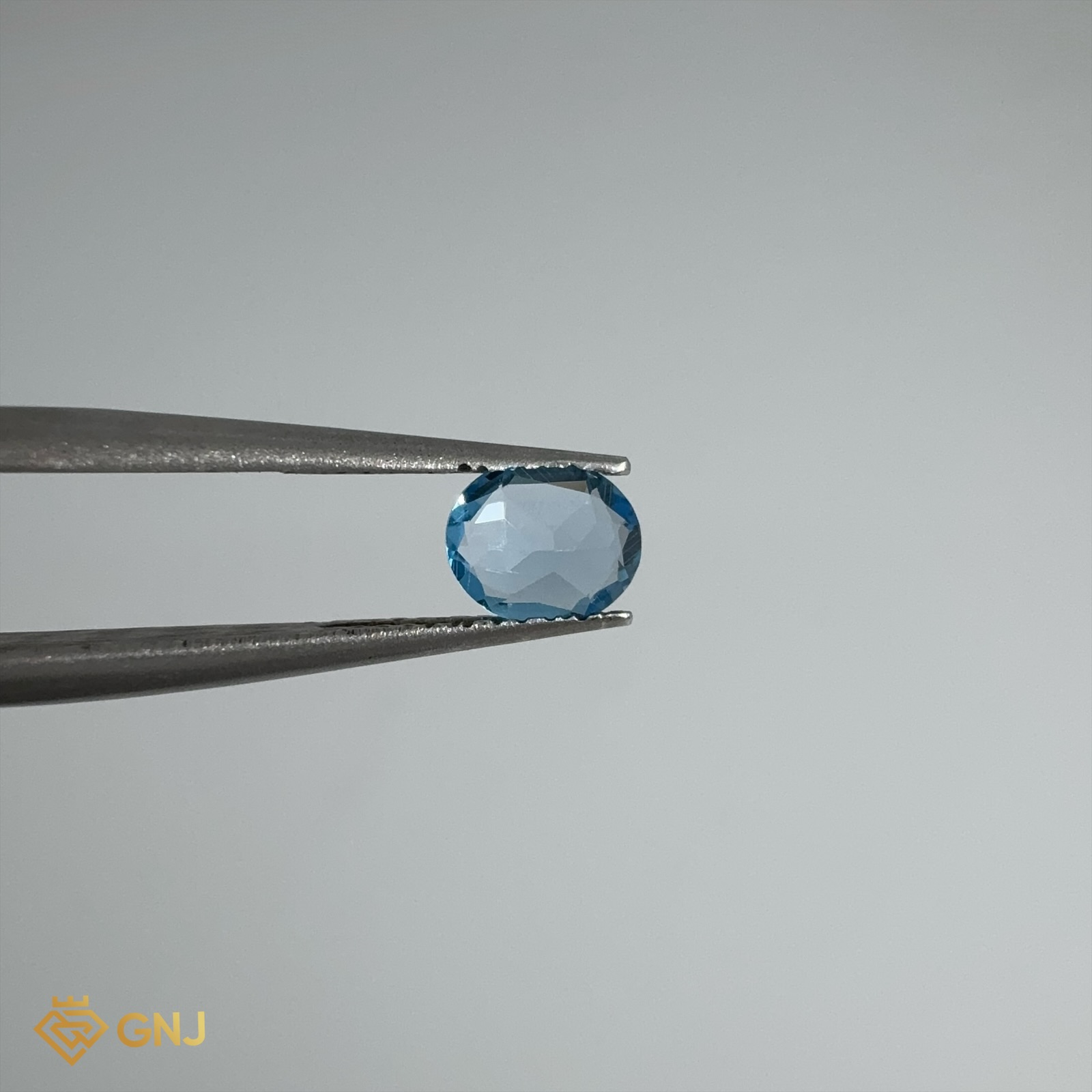 Đá Topaz Xanh Tự Nhiên 0.75ct — 5.9x4.9mm — mặt bên