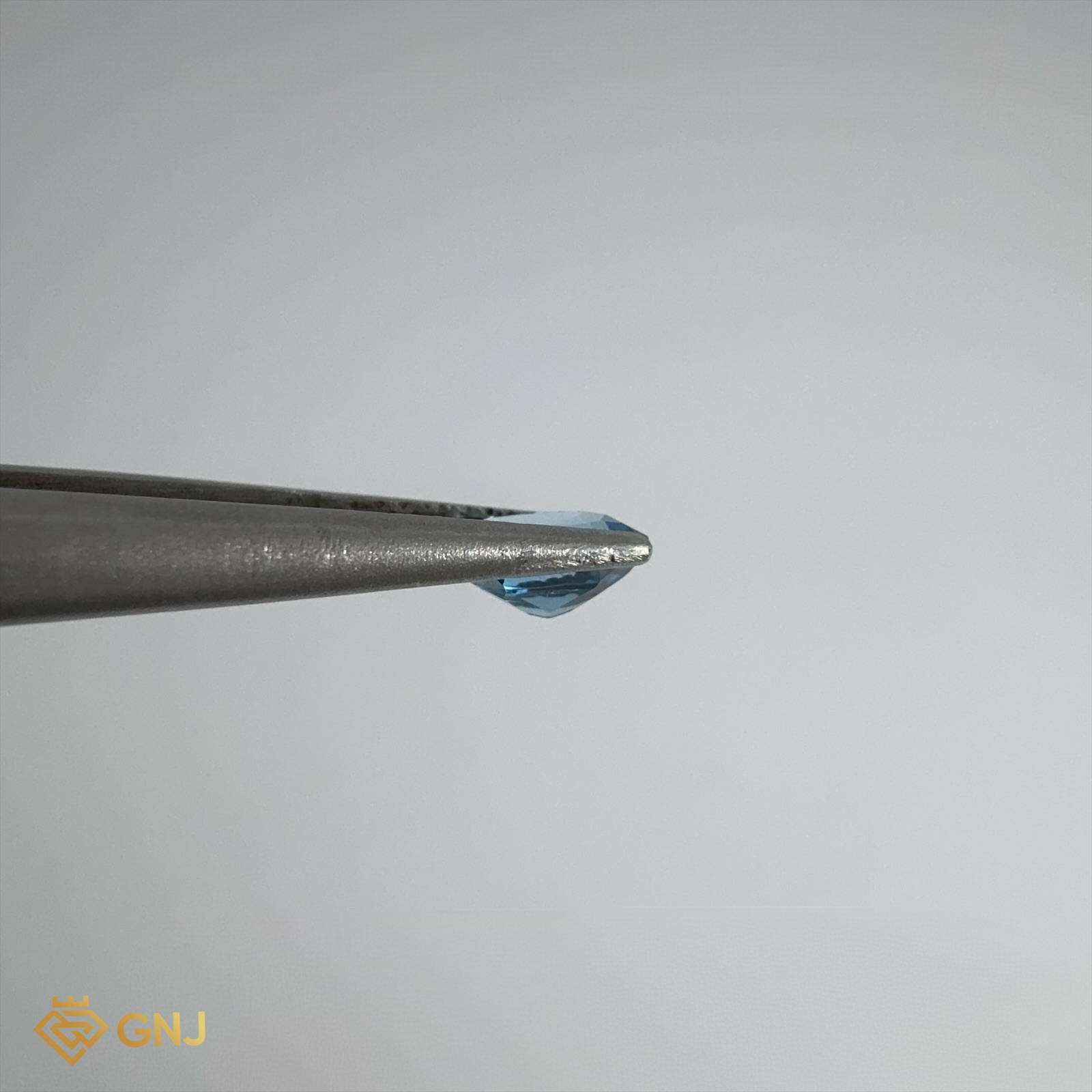 Đá Topaz Xanh Tự Nhiên 0.75ct — 5.9x4.9mm — chi tiết đá