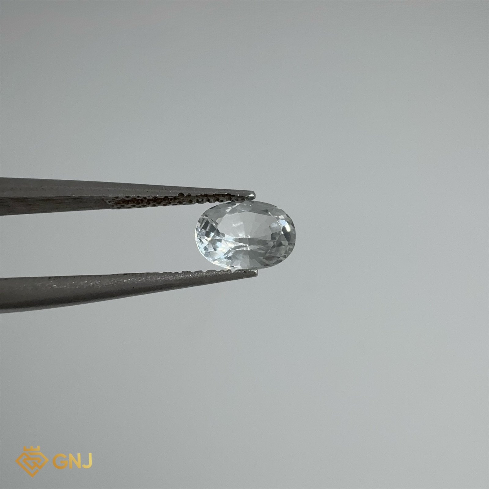 Đá Topaz Tự Nhiên Trắng 0.95ct — mặt trước, đá quý tự nhiên có kiểm định GNJ