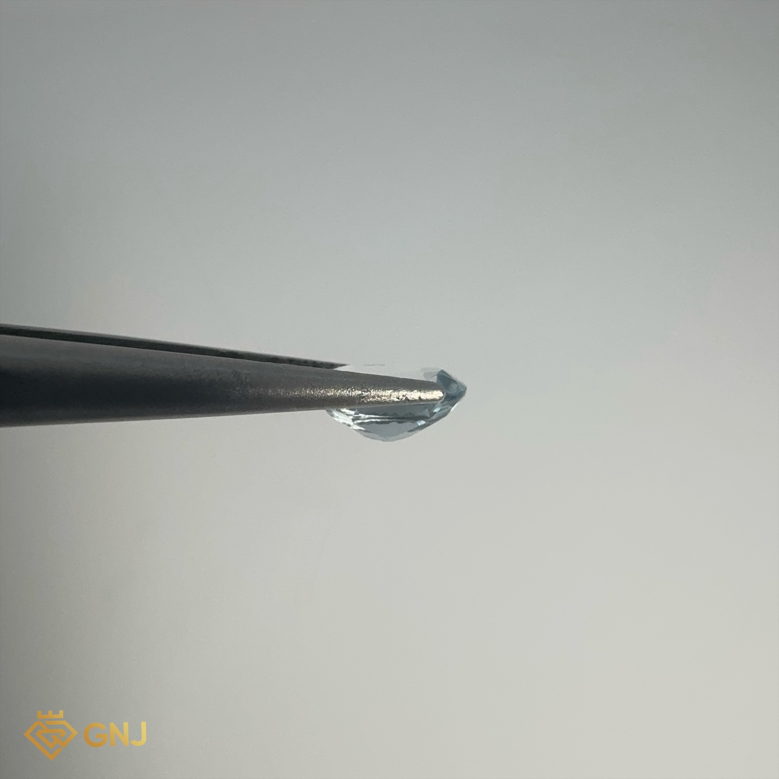Đá Topaz Xanh Tự Nhiên 0.9ct — 7.0x5.2mm — chi tiết đá