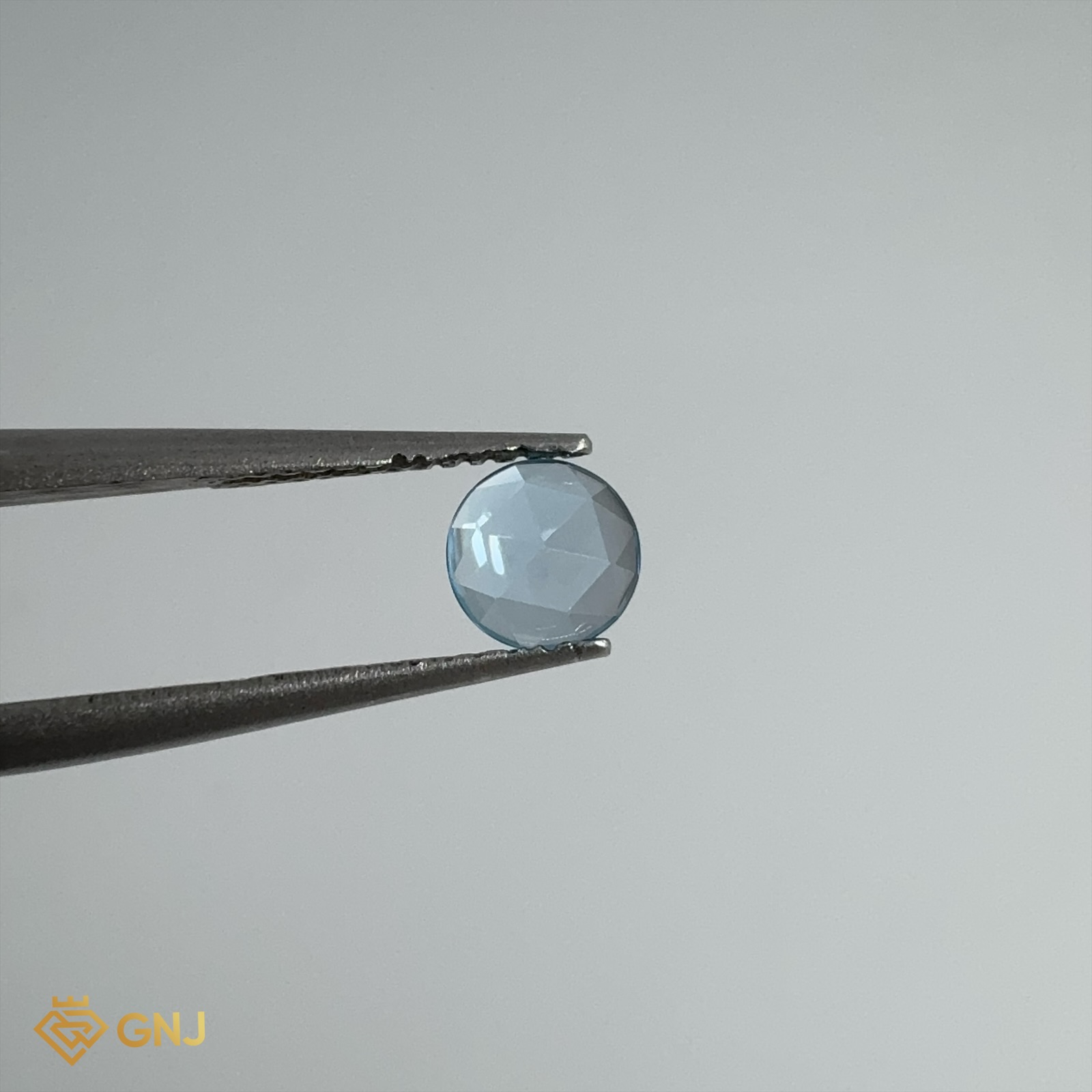 Đá Topaz Xanh Tự Nhiên 0.6ct — 5.1x5.1mm — mặt bên