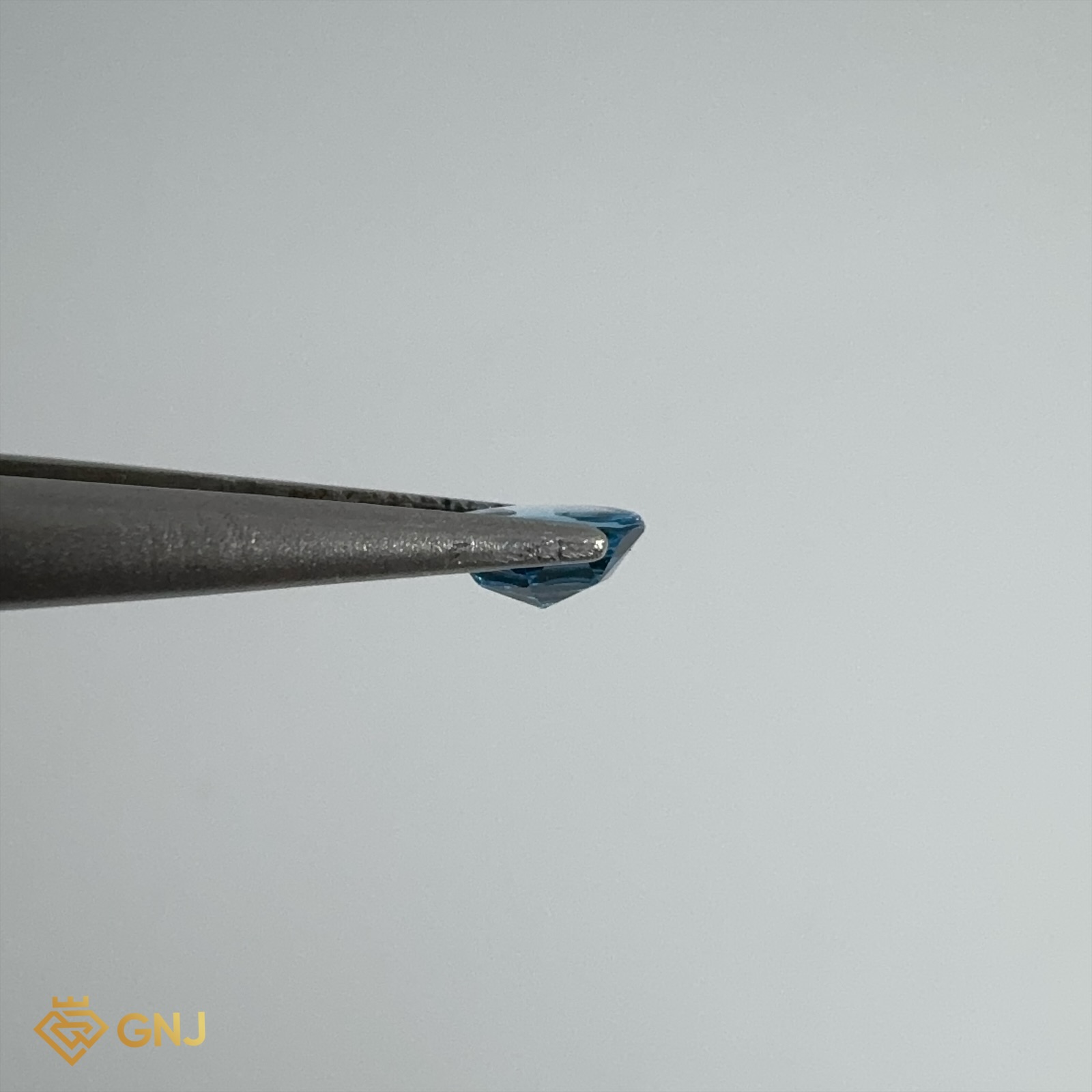Đá Topaz Xanh Tự Nhiên 0.6ct — 5.1x5.1mm — chi tiết đá