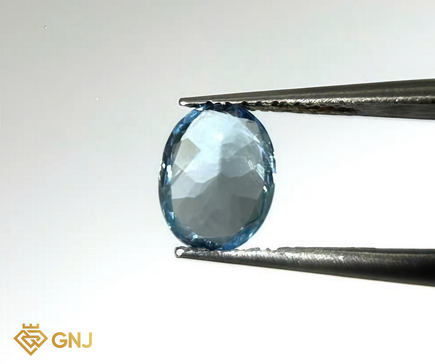 Đá Topaz Xanh Tự Nhiên 1.65ct — 8.0x6.0mm — mặt bên