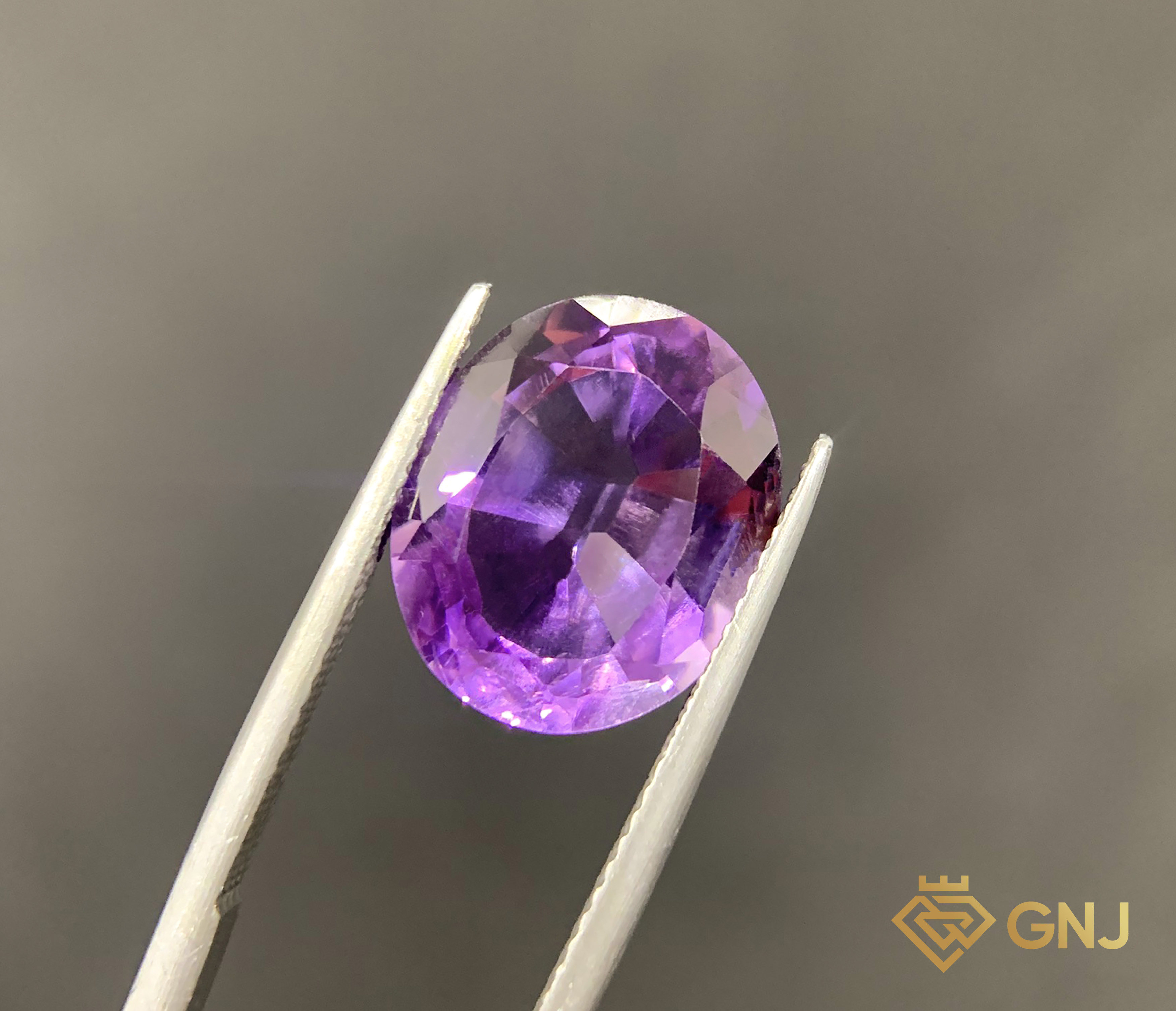 Đá Amethyst Tự Nhiên 7.55ct — Facet — mặt trước, đá quý tự nhiên có kiểm định GNJ