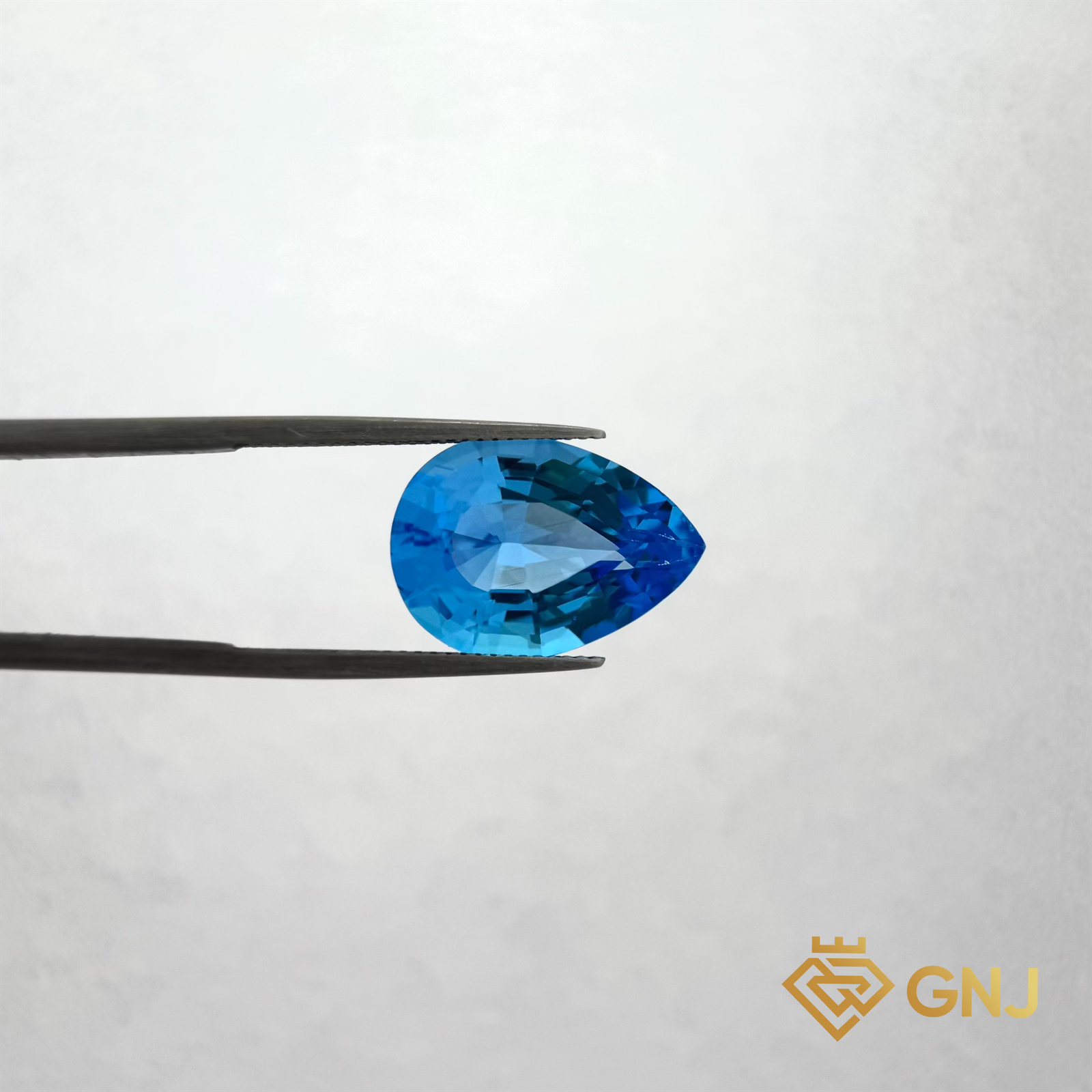 Đá Topaz Xanh Tự Nhiên 12.95ct — mặt trước, đá quý tự nhiên có kiểm định GNJ