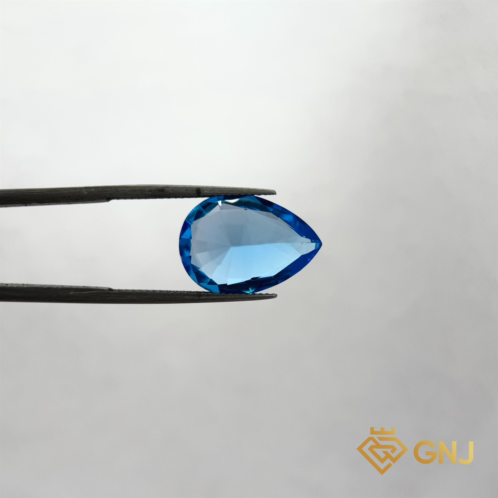 Đá Topaz Xanh Tự Nhiên 12.95ct — chi tiết đá