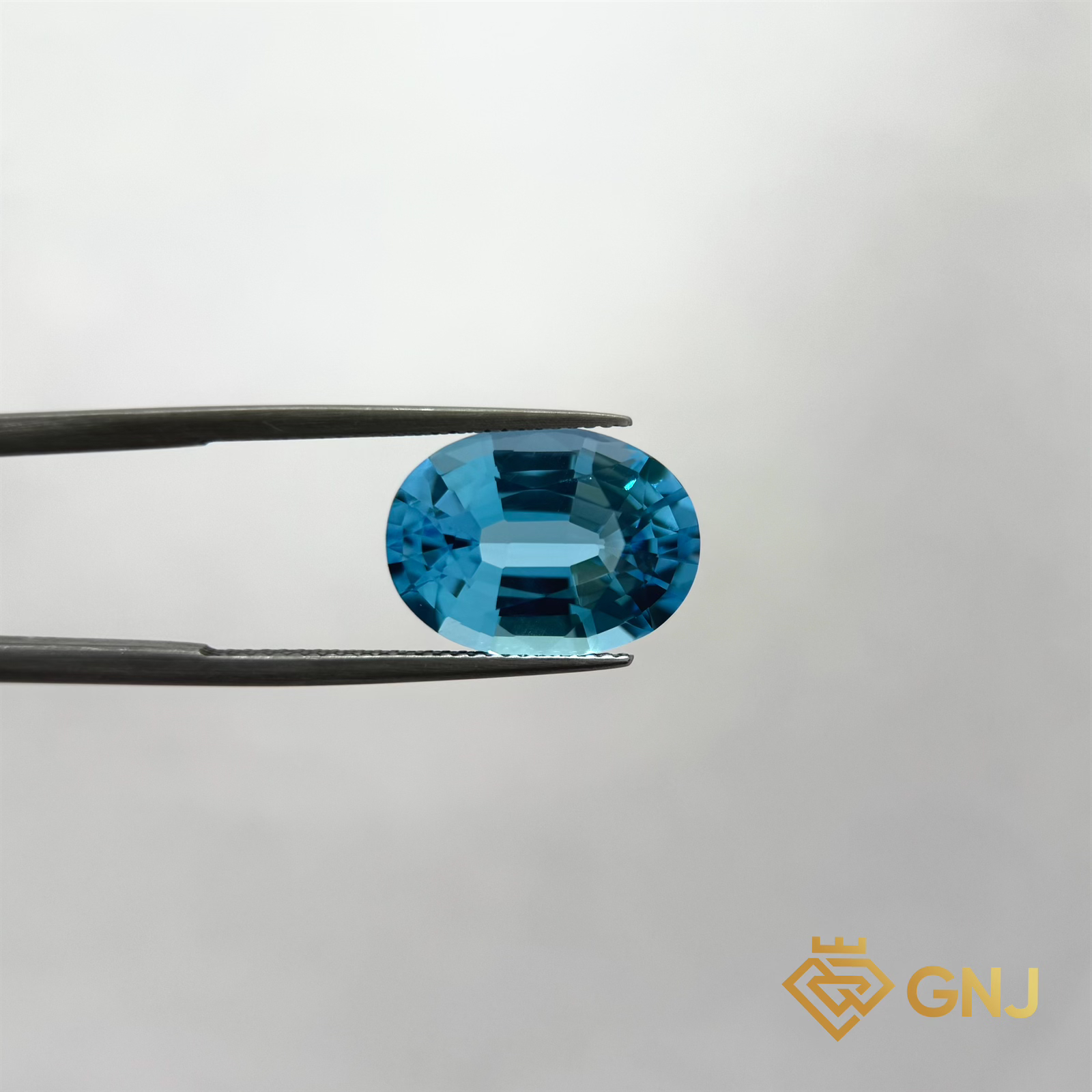 Đá Topaz Xanh Tự Nhiên Xanh Dương 11.15ct — mặt trước, đá quý tự nhiên có kiểm định GNJ