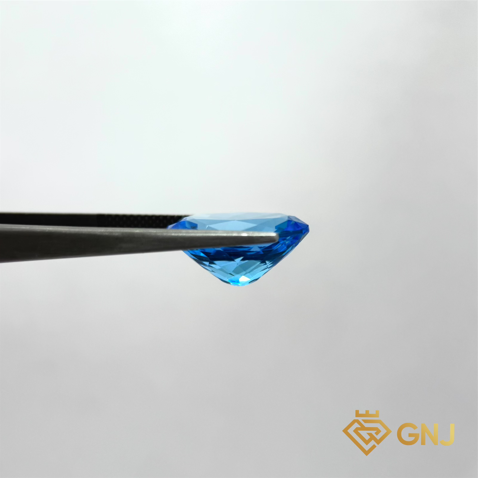 Đá Topaz Xanh Tự Nhiên Xanh Dương 11.05ct — mặt bên