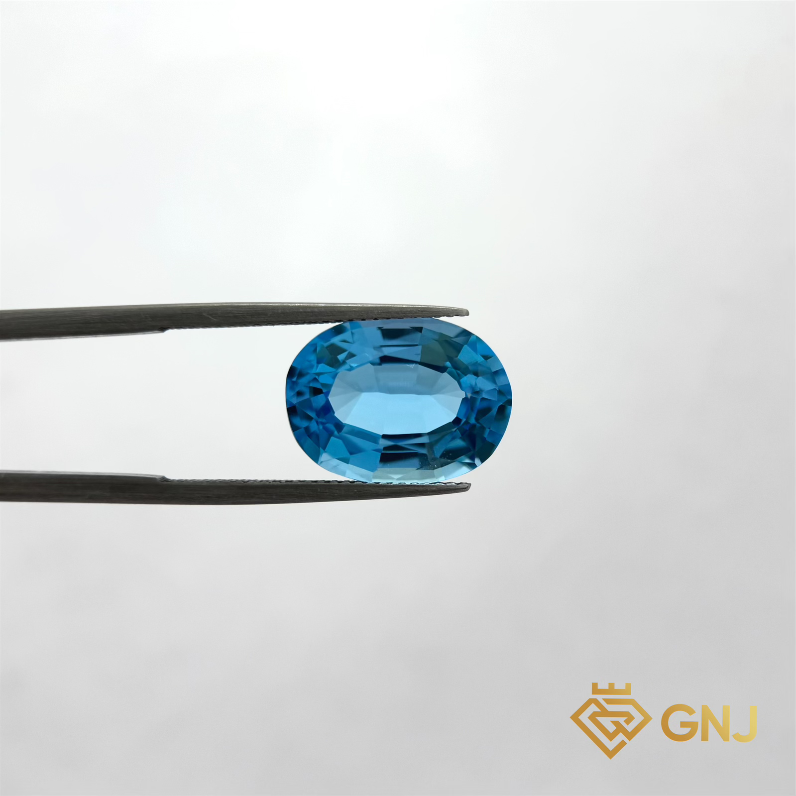 Đá Topaz Xanh Tự Nhiên 10.3ct — mặt trước, đá quý tự nhiên có kiểm định GNJ
