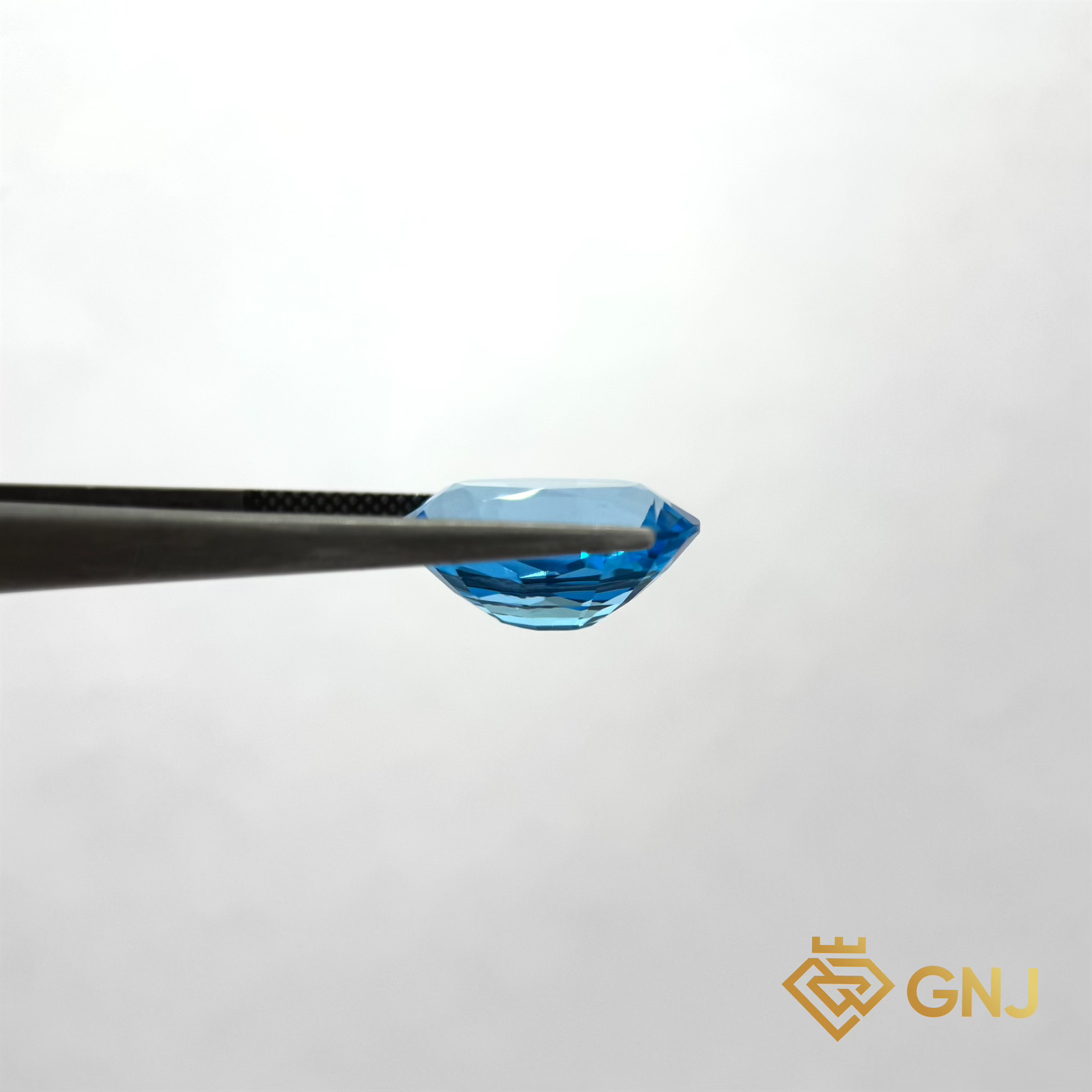 Đá Topaz Xanh Tự Nhiên 10.3ct — mặt bên