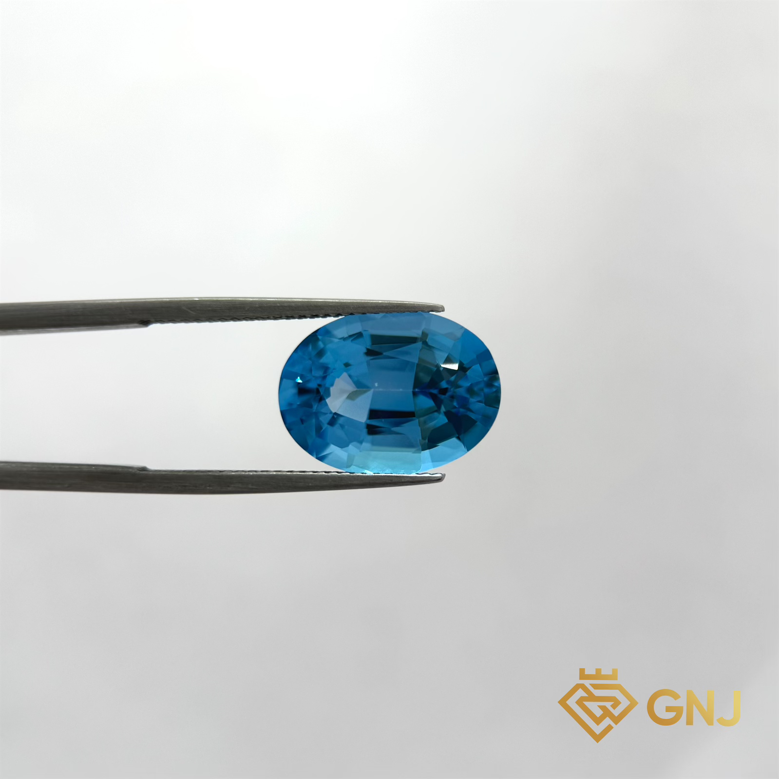 Đá Topaz Xanh Tự Nhiên 10.5ct — 15.6x11.6mm — mặt trước, đá quý tự nhiên có kiểm định GNJ
