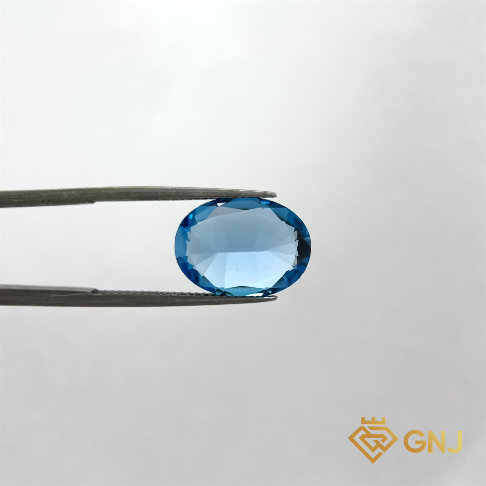 Đá Topaz Xanh Tự Nhiên 10.5ct — 15.6x11.6mm — chi tiết đá