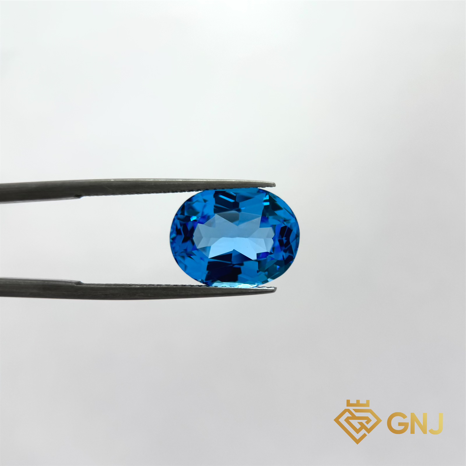 Đá Topaz Xanh Tự Nhiên Xanh Dương 8.5ct — mặt trước, đá quý tự nhiên có kiểm định GNJ