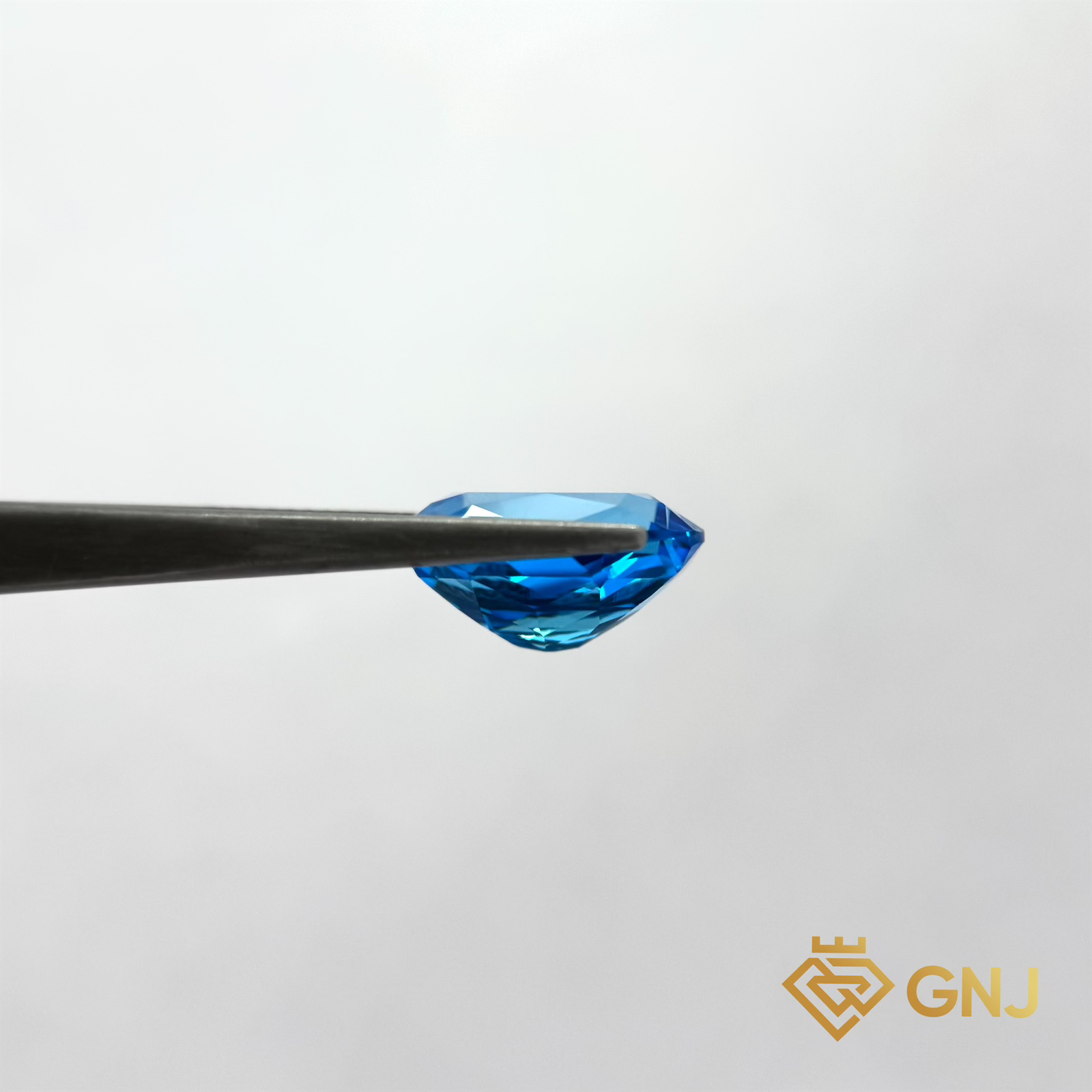Đá Topaz Xanh Tự Nhiên Xanh Dương 8.5ct — mặt bên