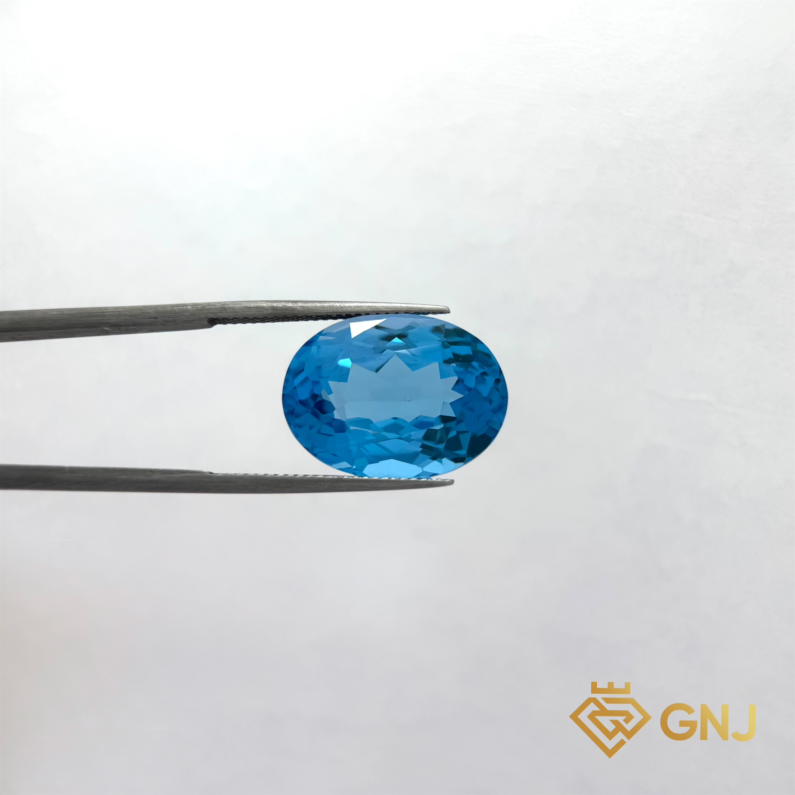 Đá Topaz Xanh Tự Nhiên 19.3ct — mặt trước, đá quý tự nhiên có kiểm định GNJ