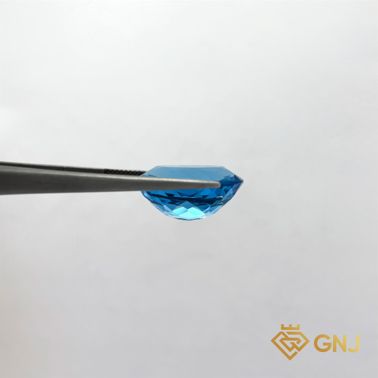 Đá Topaz Xanh Tự Nhiên 19.3ct — mặt bên