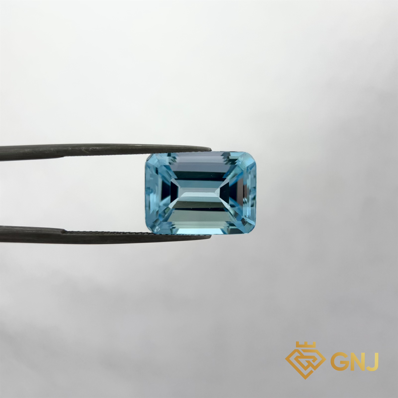 Đá Topaz Xanh Tự Nhiên Xanh Dương 15.25ct — mặt trước, đá quý tự nhiên có kiểm định GNJ