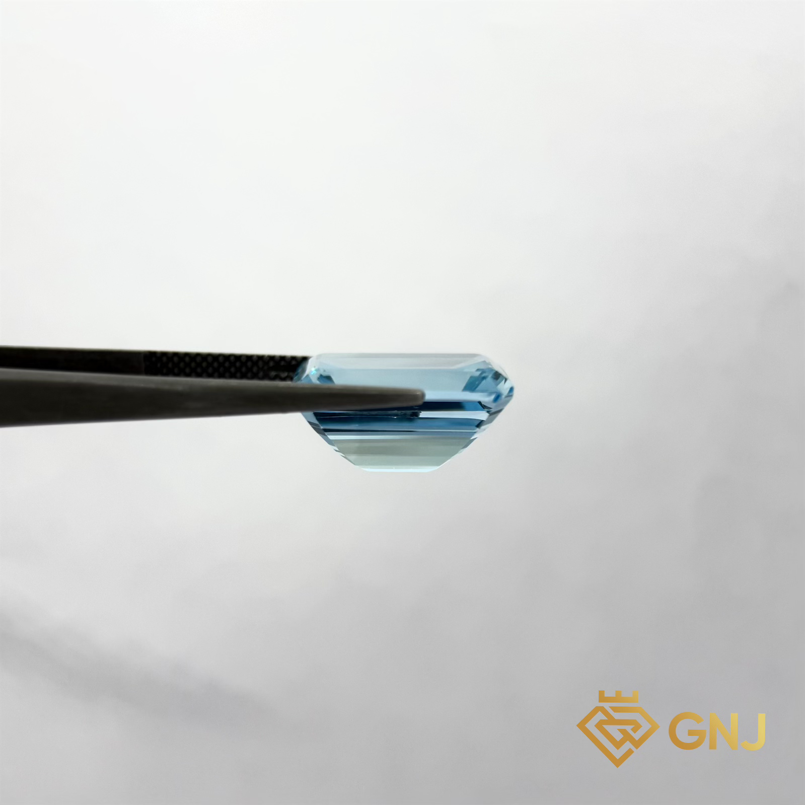 Đá Topaz Xanh Tự Nhiên Xanh Dương 15.25ct — mặt bên