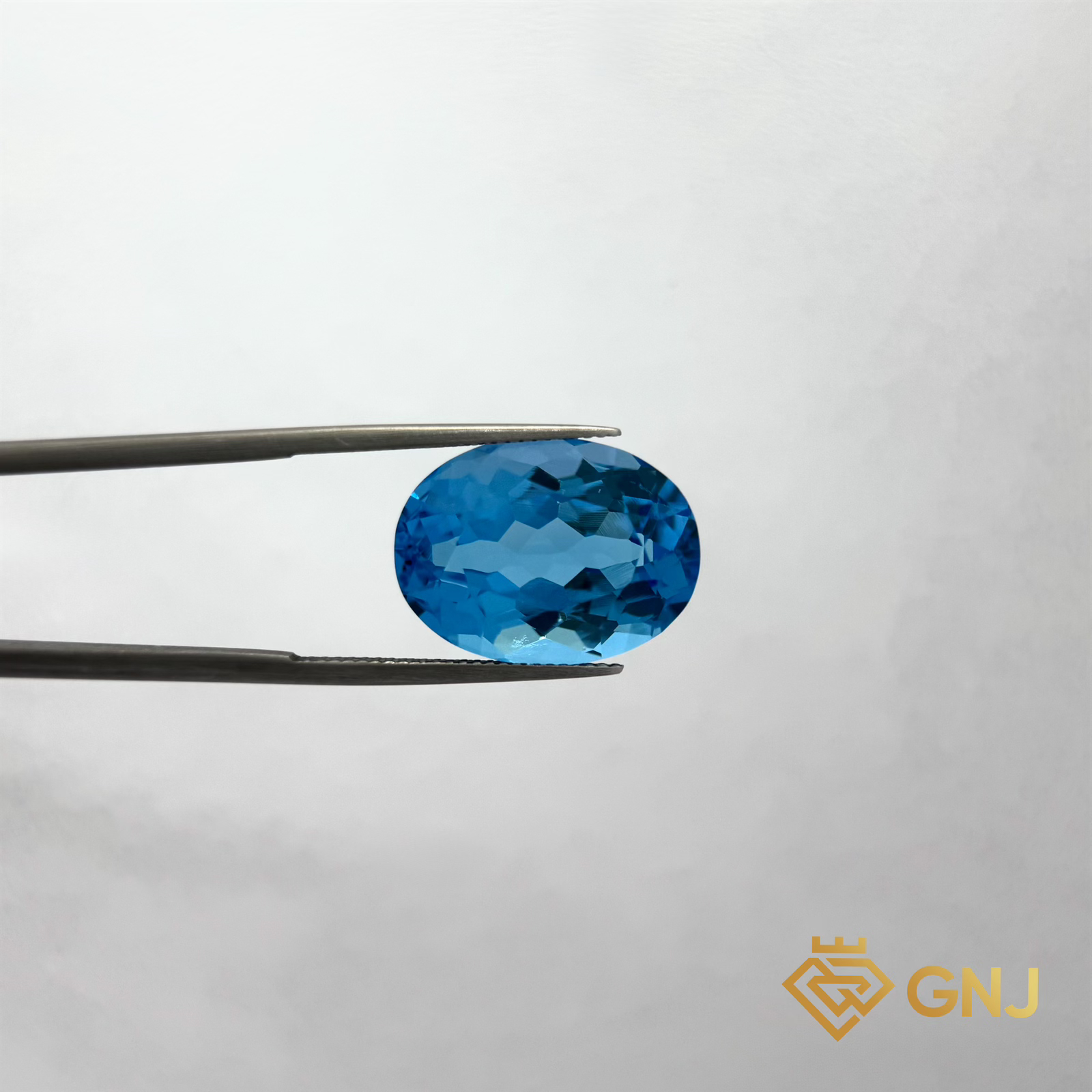 Đá Topaz Xanh Tự Nhiên 22.65ct — mặt trước, đá quý tự nhiên có kiểm định GNJ