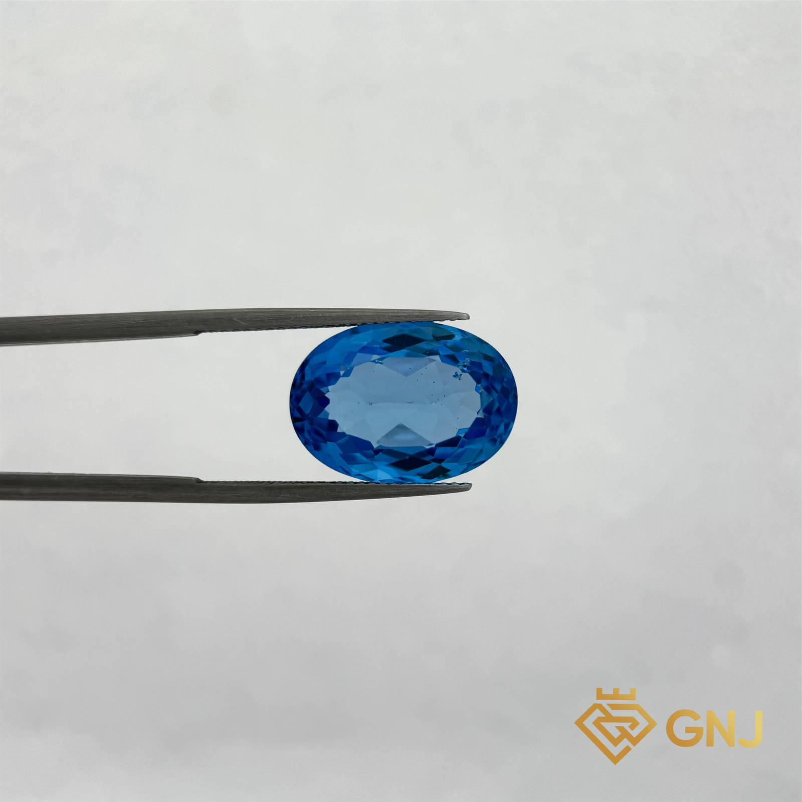 Đá Topaz Xanh Tự Nhiên 16.7ct — mặt trước, đá quý tự nhiên có kiểm định GNJ