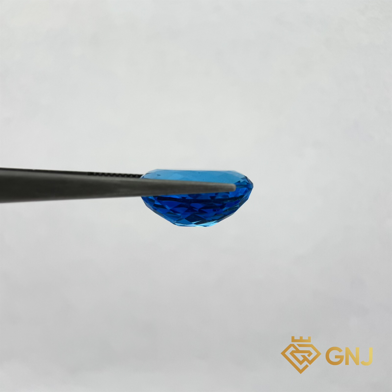 Đá Topaz Xanh Tự Nhiên 16.7ct — mặt bên