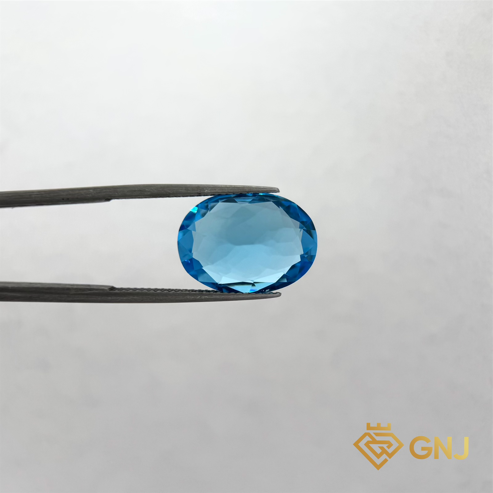 Đá Topaz Xanh Tự Nhiên 12.6ct — chi tiết đá