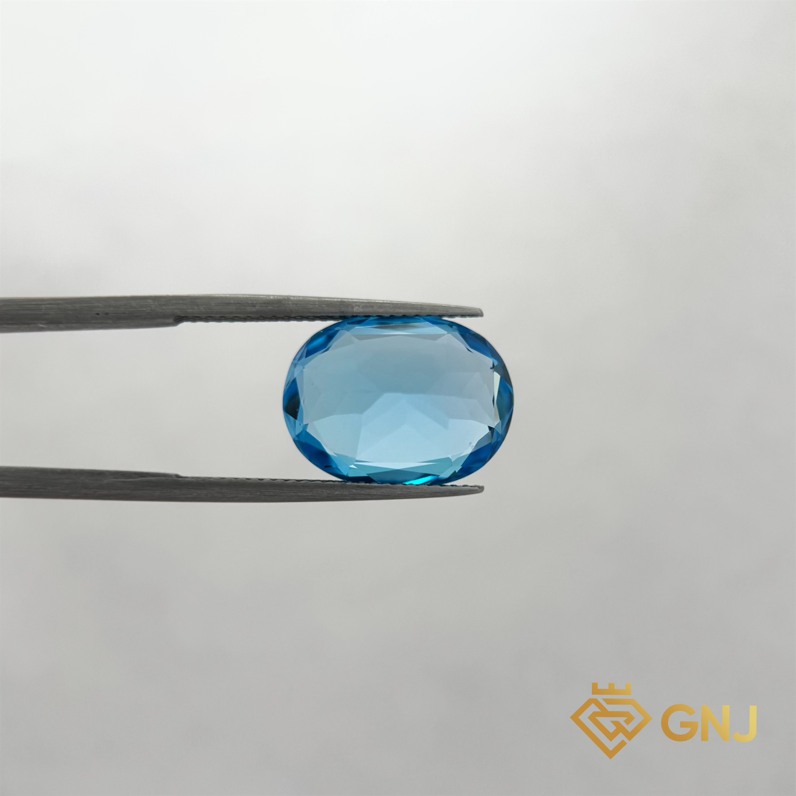 Đá Topaz Xanh Tự Nhiên 11.95ct — chi tiết đá