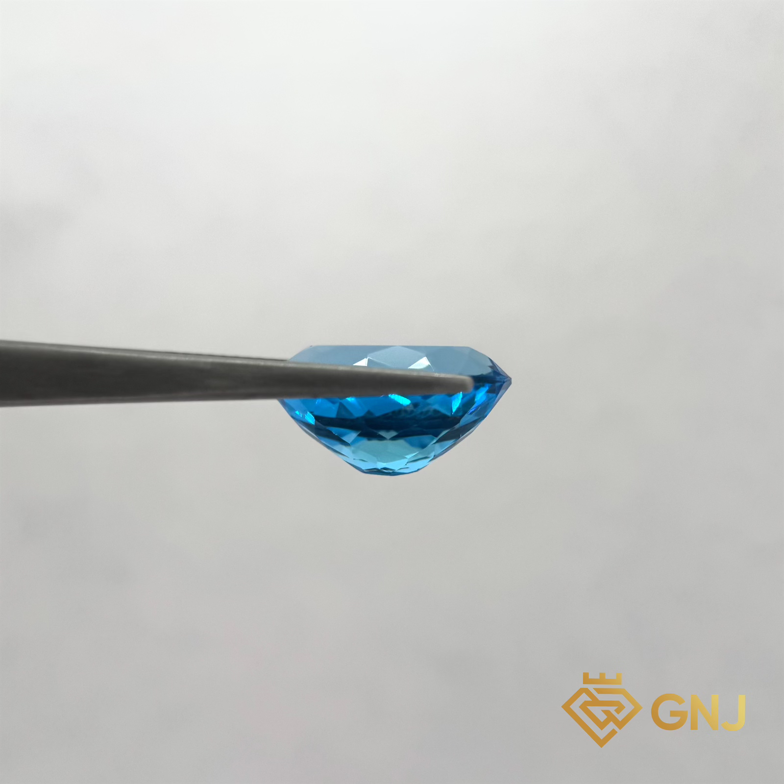 Đá Topaz Xanh Tự Nhiên Xanh Dương 13.25ct — mặt bên