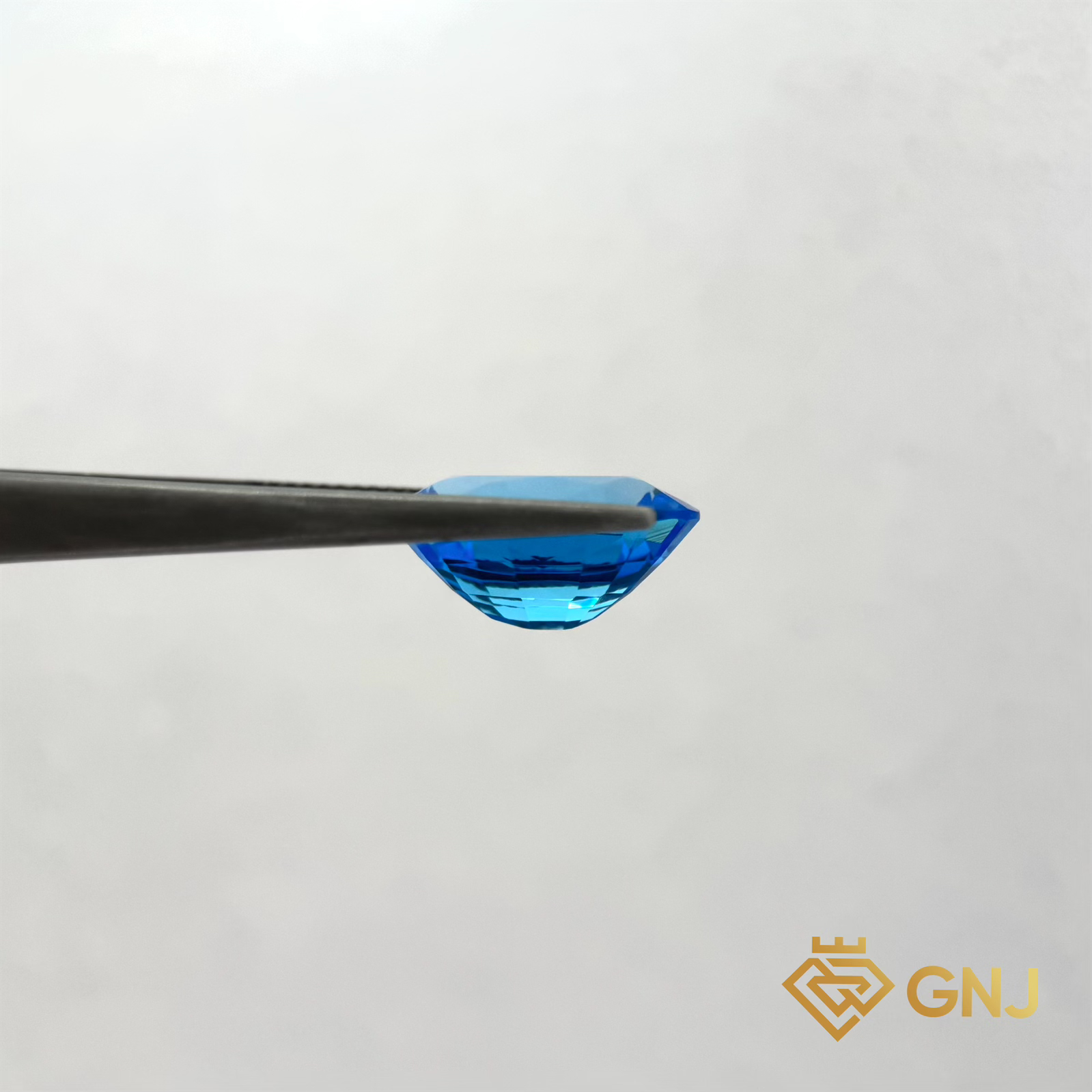 Đá Topaz Xanh Tự Nhiên Xanh Dương 10.15ct — mặt bên