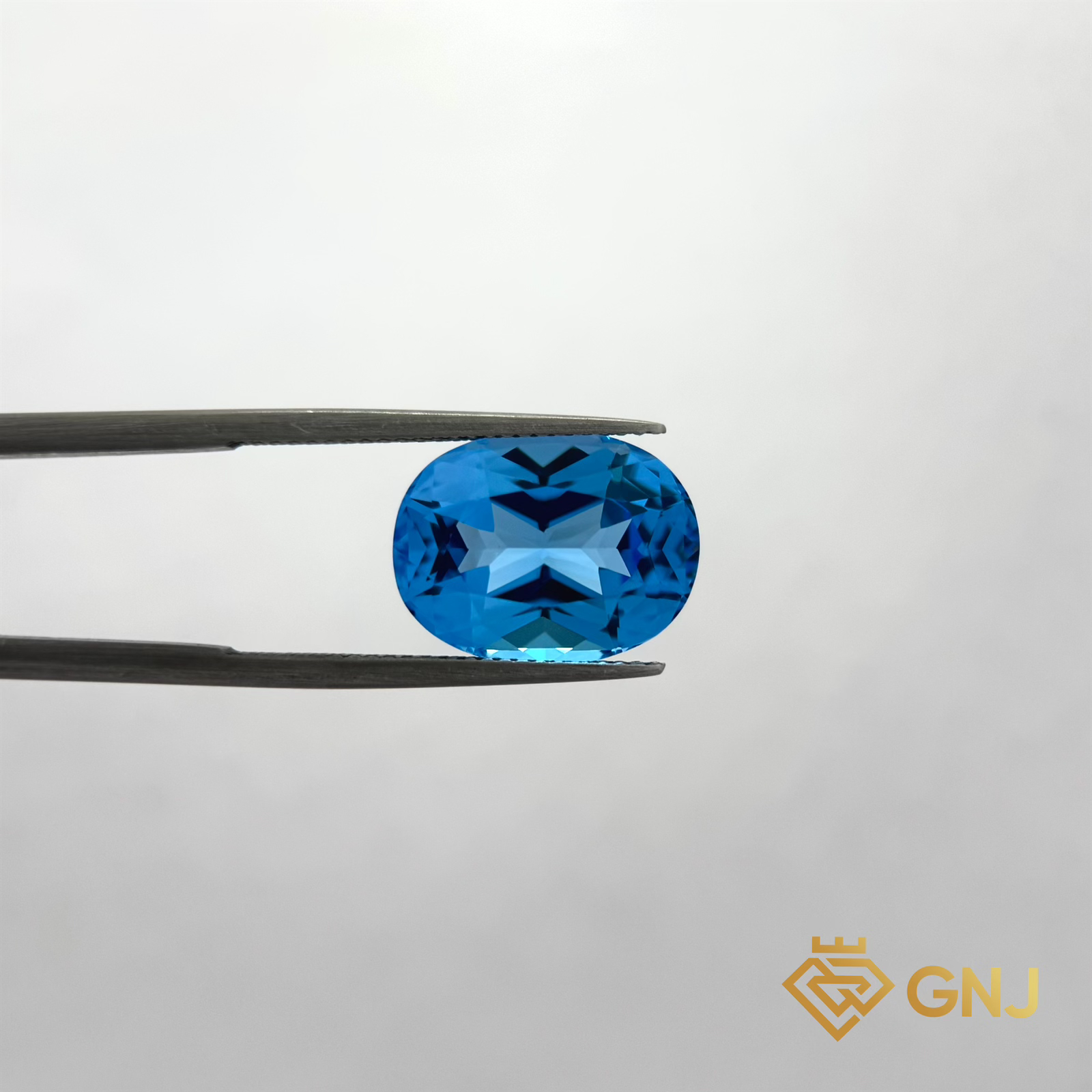 Đá Topaz Xanh Tự Nhiên 10.55ct — mặt trước, đá quý tự nhiên có kiểm định GNJ