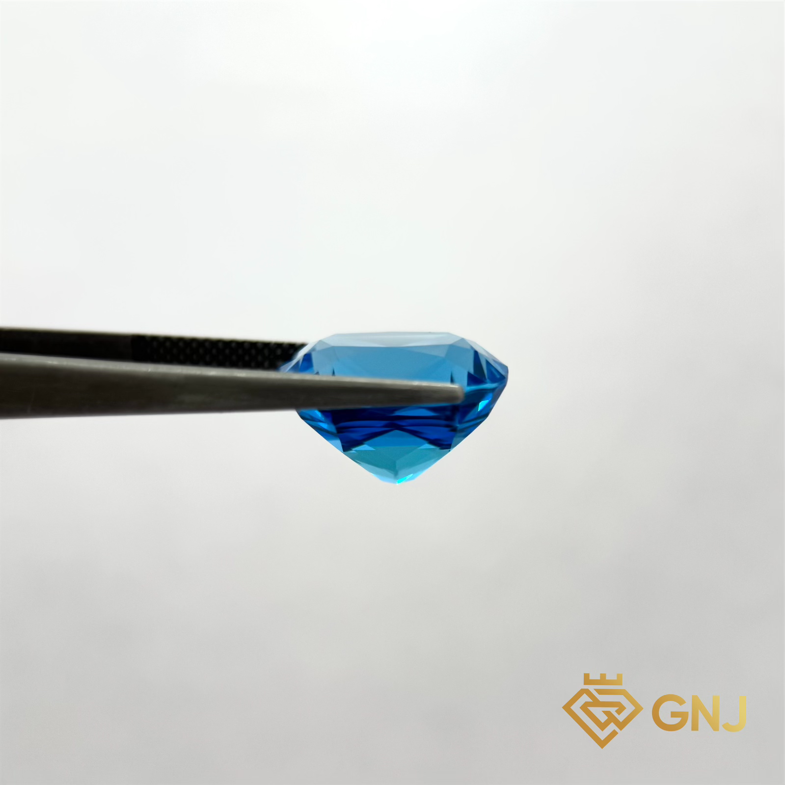 Đá Topaz Xanh Tự Nhiên Xanh Dương 13.25ct — mặt bên