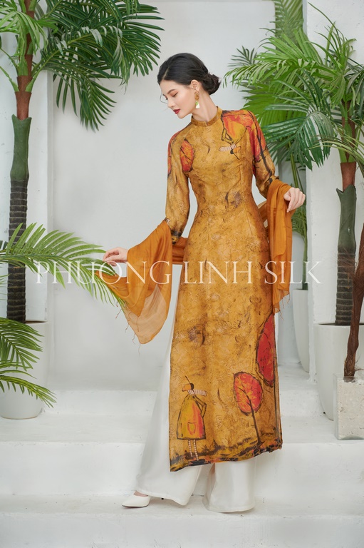 ÁO DÀI THỜI TRANG 4 TÀ MÀU VÀNG LÁ