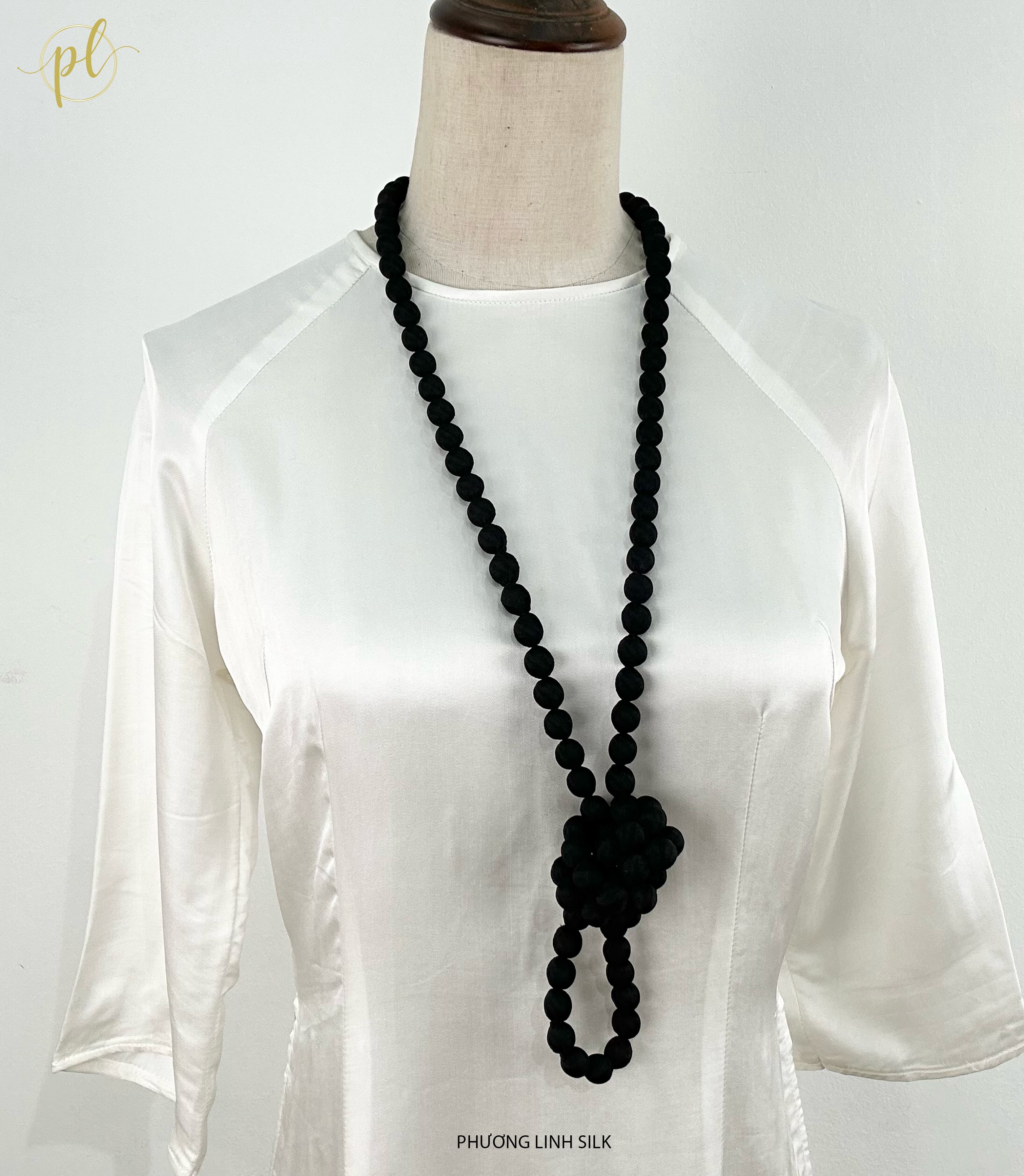 VÒNG HẠT GỖ BỌC LỤA