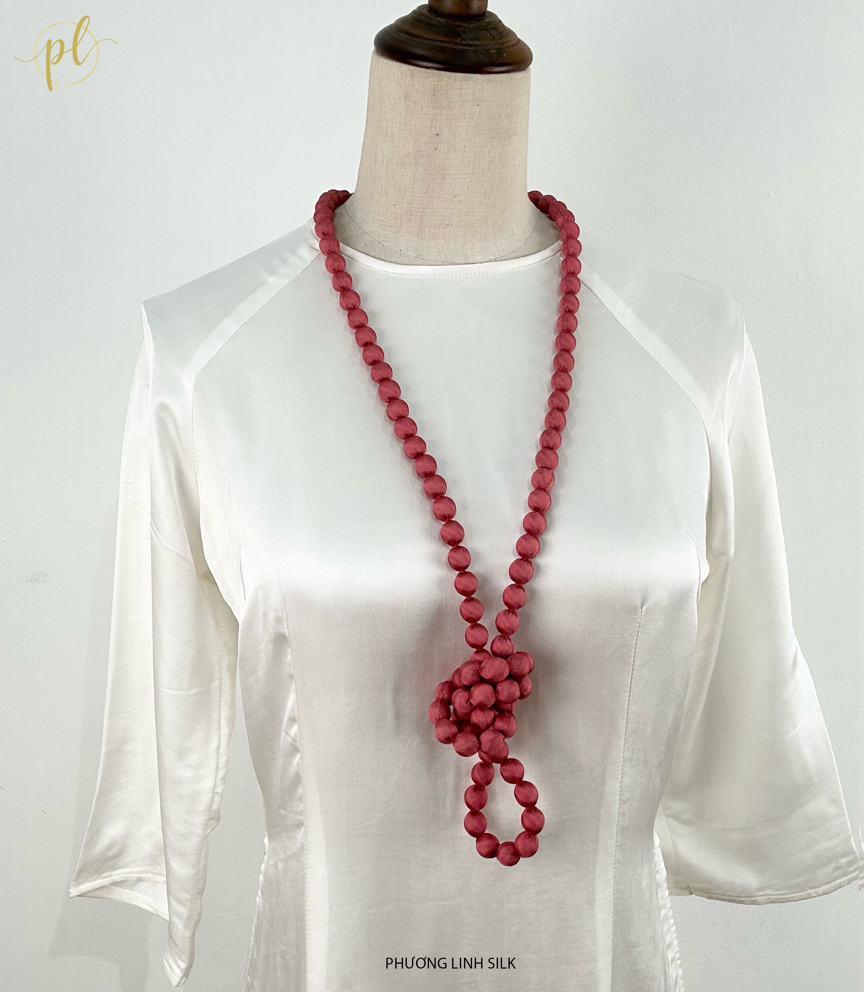 VÒNG HẠT GỖ BỌC LỤA