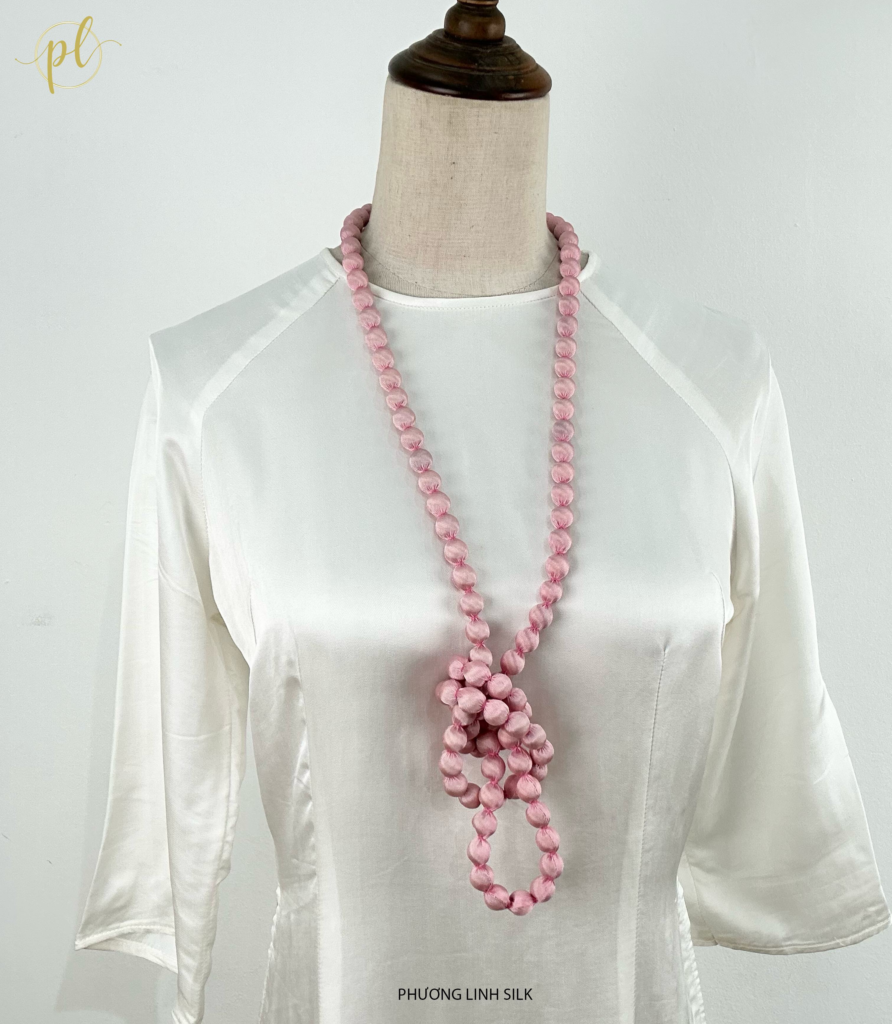 VÒNG HẠT GỖ BỌC LỤA